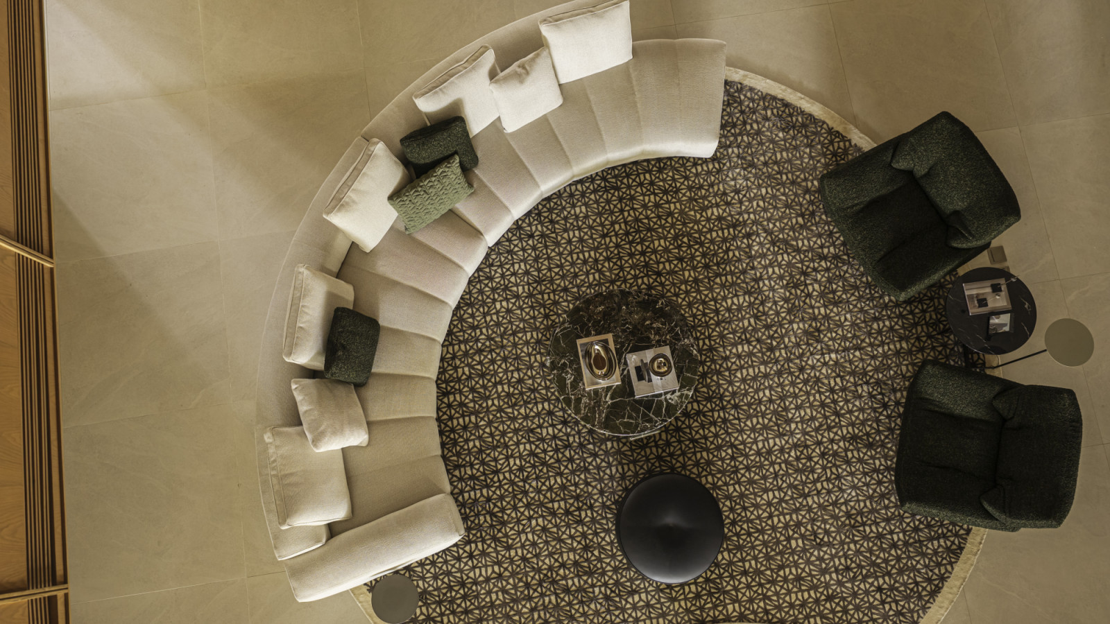 The curved sofa is echoed in the sweeping curves of the architecture, and vice versa