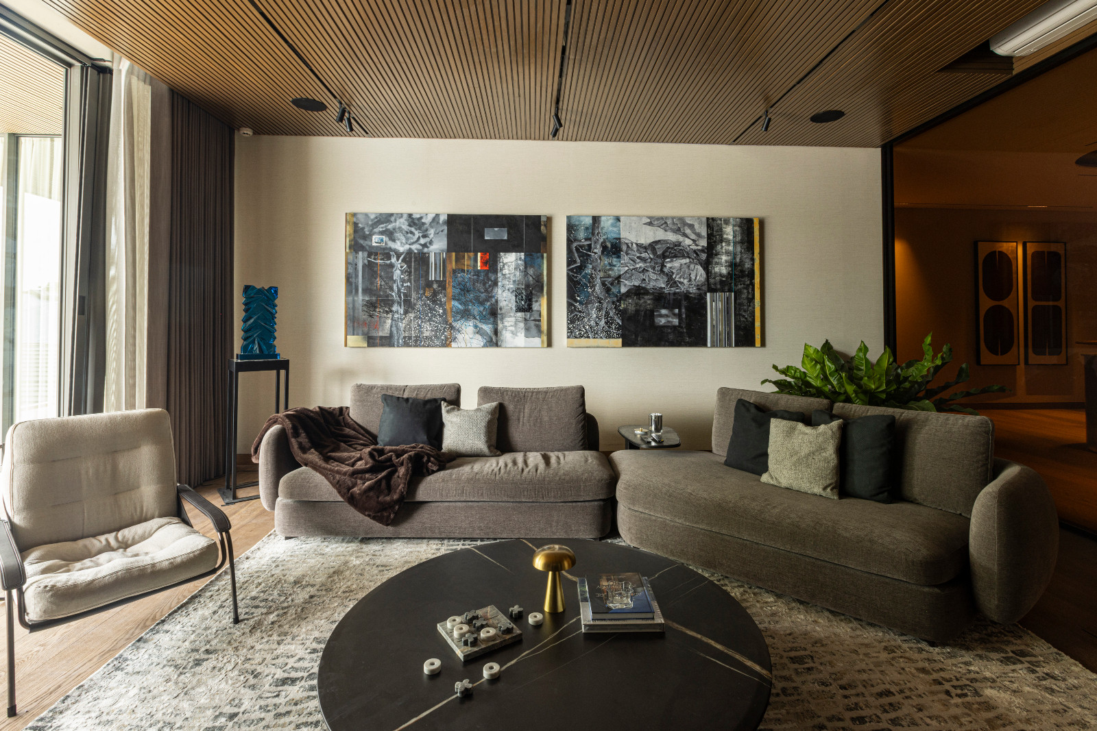 Glimpses of the homeowners' personality can be seen in this lounge