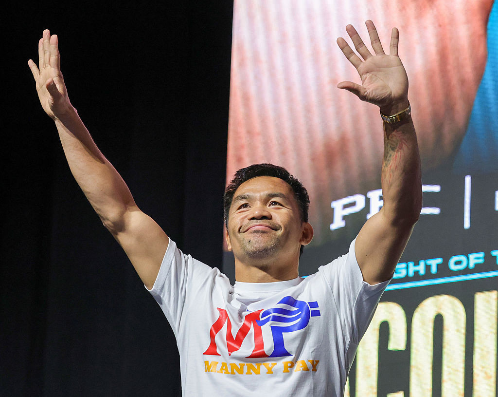 Manny Pacquiao gestures to fans during a ceremonial weigh-in at MGM Grand Garden Arena on July 18, 2025 in Las Vegas, Nevada. Pacquiao, who announced he was coming out of retirement nearly four years after his last fight, is scheduled to challenge WBC welterweight champion Mario Barrios for his title on July 19 at MGM Grand Garden Arena. (Photo by Ethan Miller/Getty Images)
