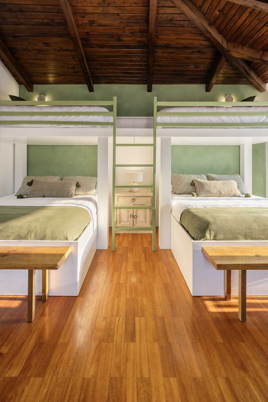 Bunk beds were custom-built into several rooms to sleep the extended family without crowding the space