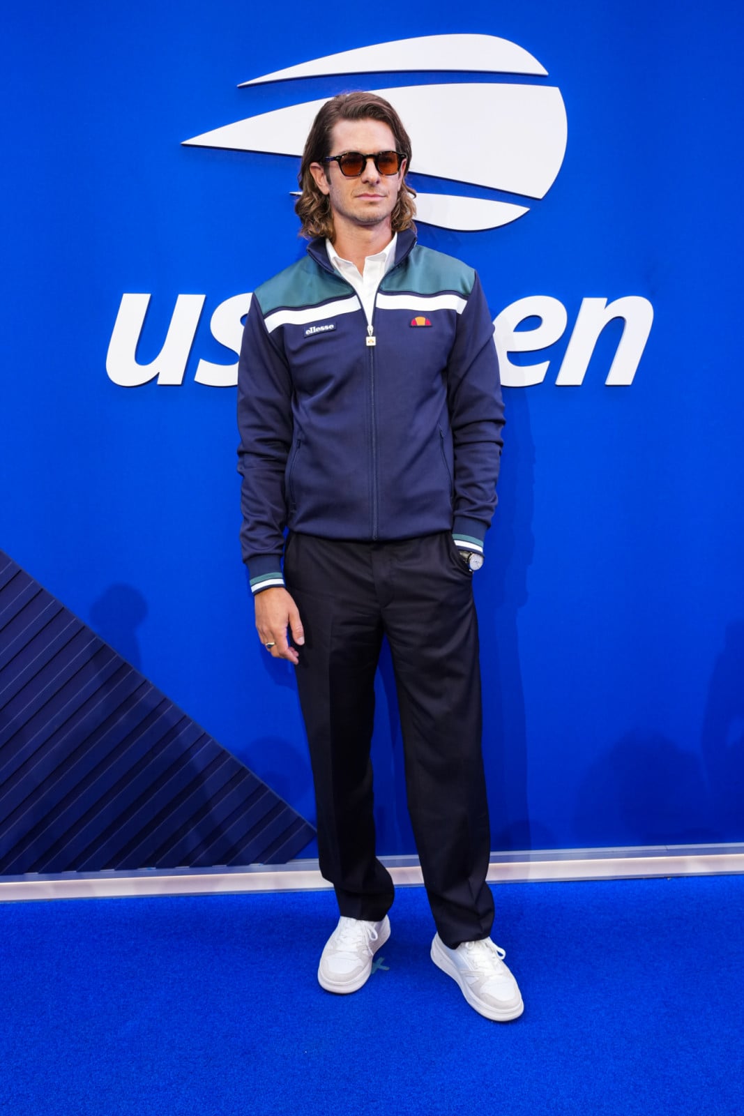 NEW YORK, NEW YORK - SEPTEMBER 12: Andrew Garfield attends the US Open Women's Final wearing ellesse at Arthur Ashe Stadium on September 12, 2026 in New York City. (Photo by John Nacion/Getty Images for ellesse)