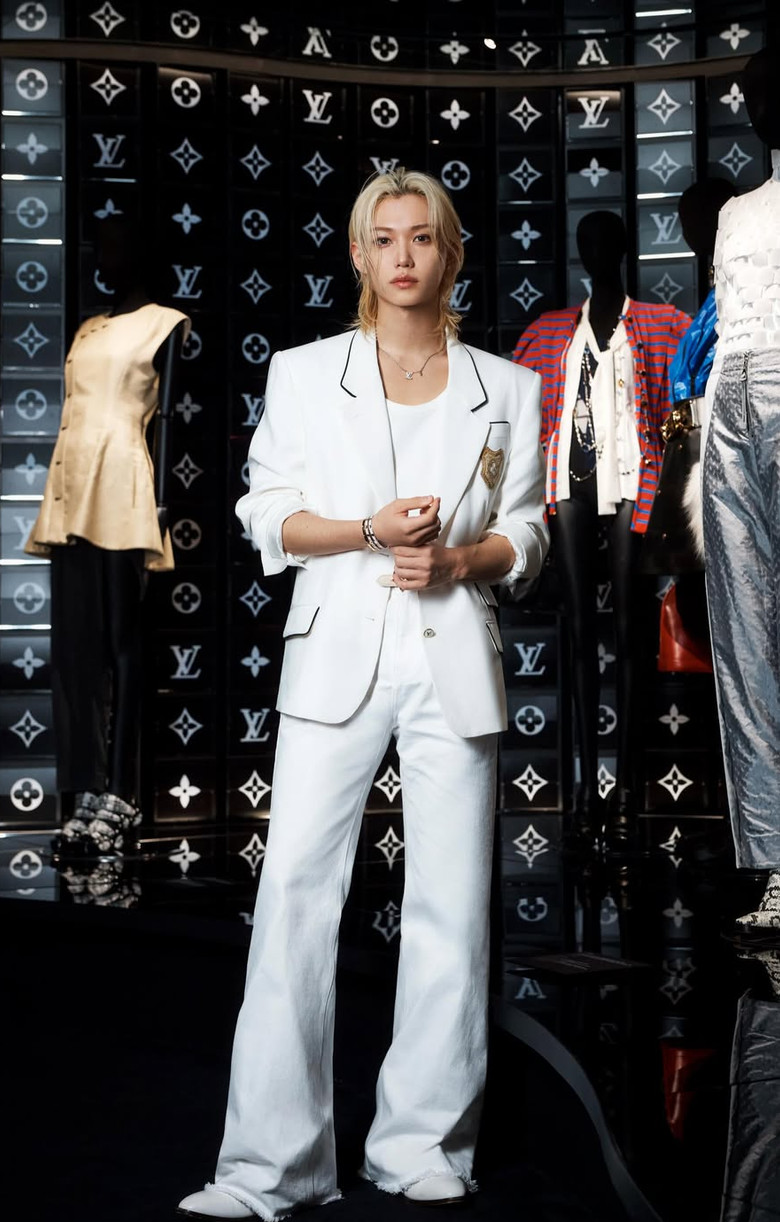 Stray Kids' Felix attends a Louis Vuitton event in an all-white ensemble.