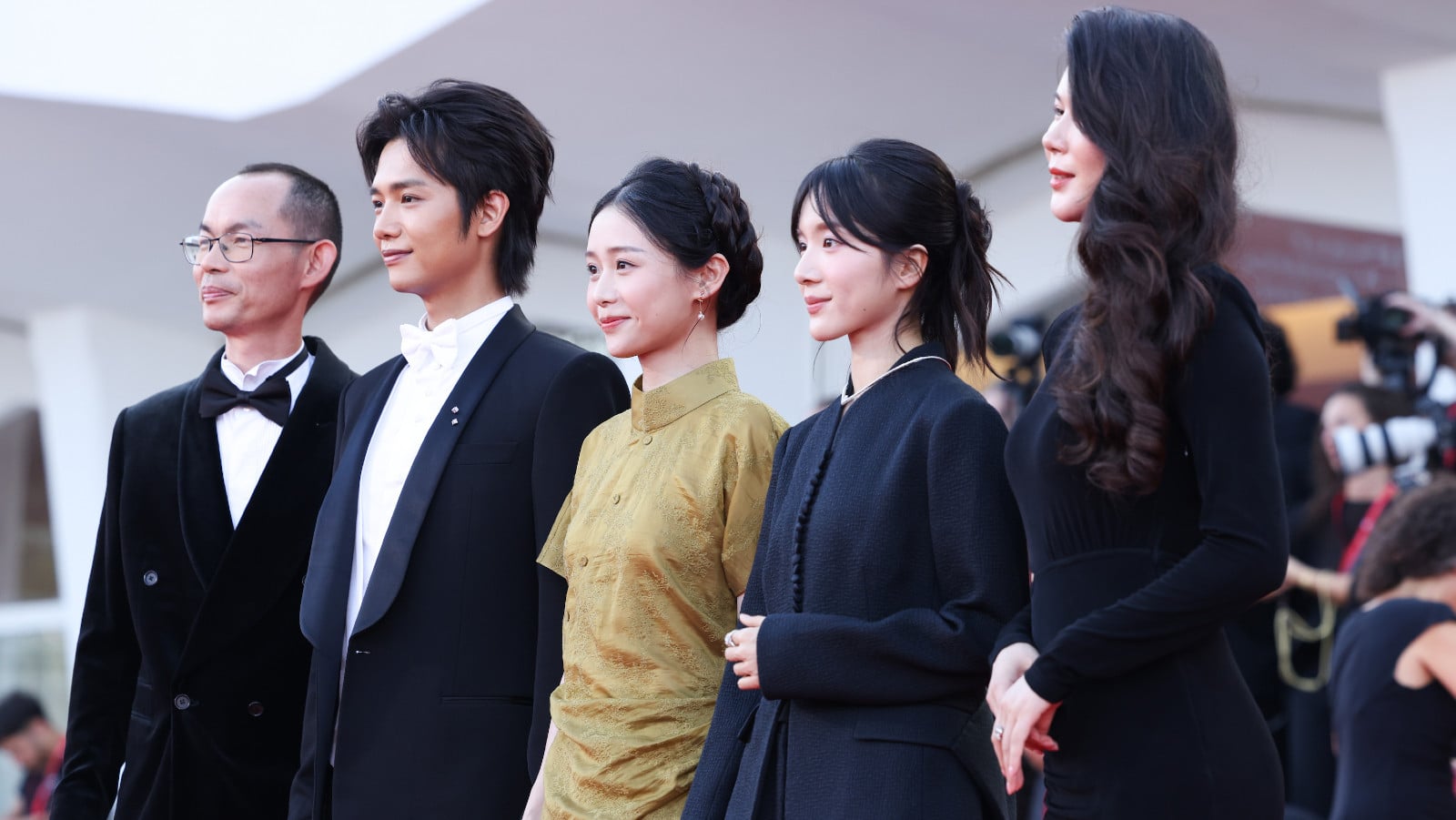 From left, director Lan Hongchun, actors Wang Yantong, Wang Xiaohui and Li Sitong, and producer Zheng Xuanxuan attend a screening during the 83rd Venice International Film Festival. (Photo: Stefania D’Alessandro/WireImage)