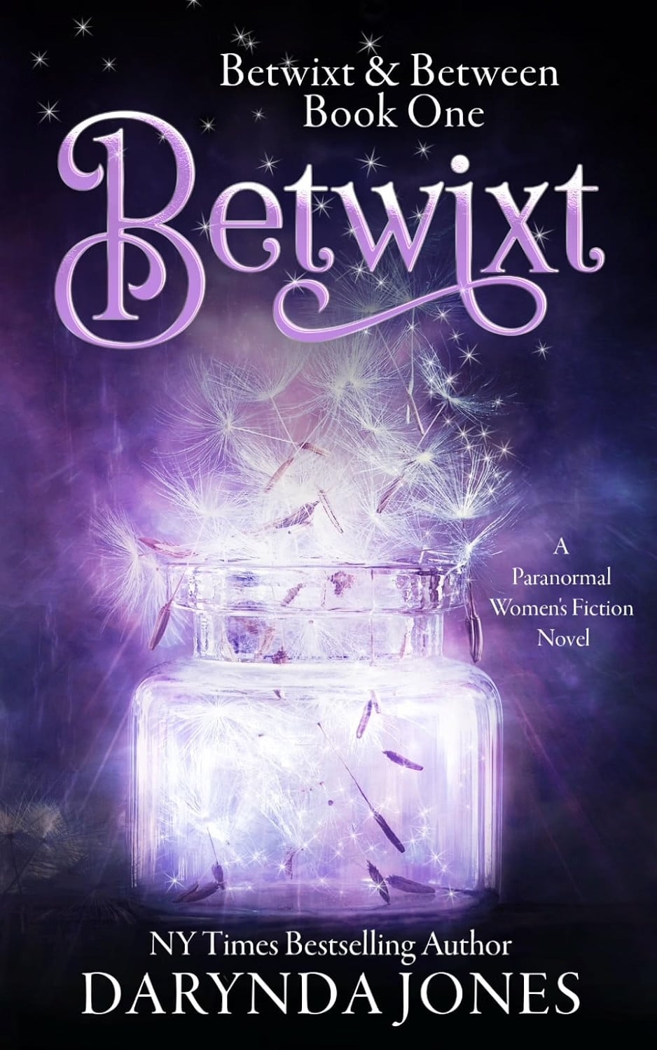 "Betwixt & Between Book One," a Paranormal Women's Fiction novel by Darynda Jones, features a jar of glowing dandelion seeds.