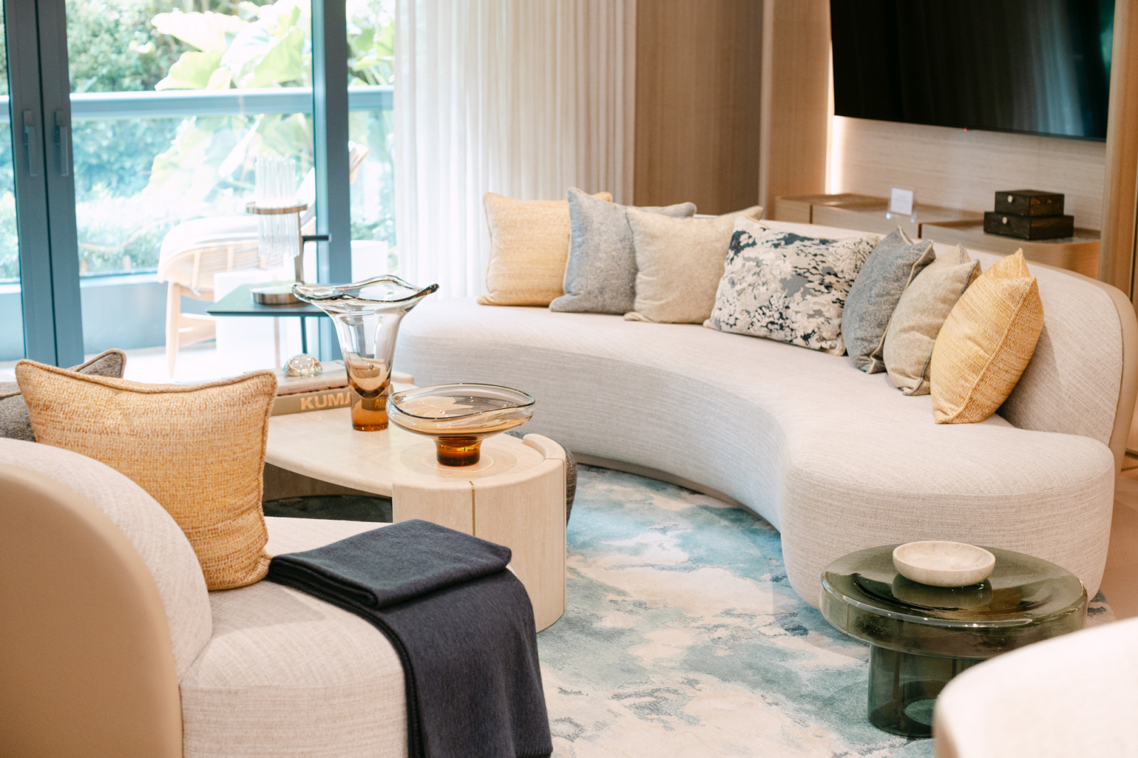 The living room of the three-bedroom unit at Shang Bauhinia Residences's show suite