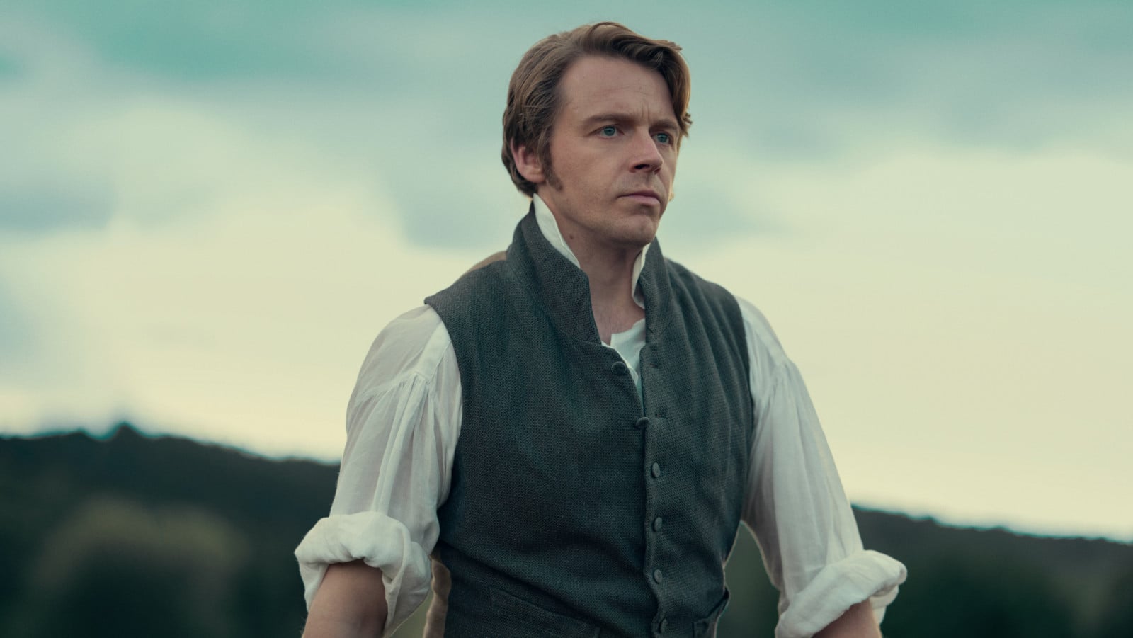 A man in period attire, his resolute gaze hinting at the complexities of pride and social convention.