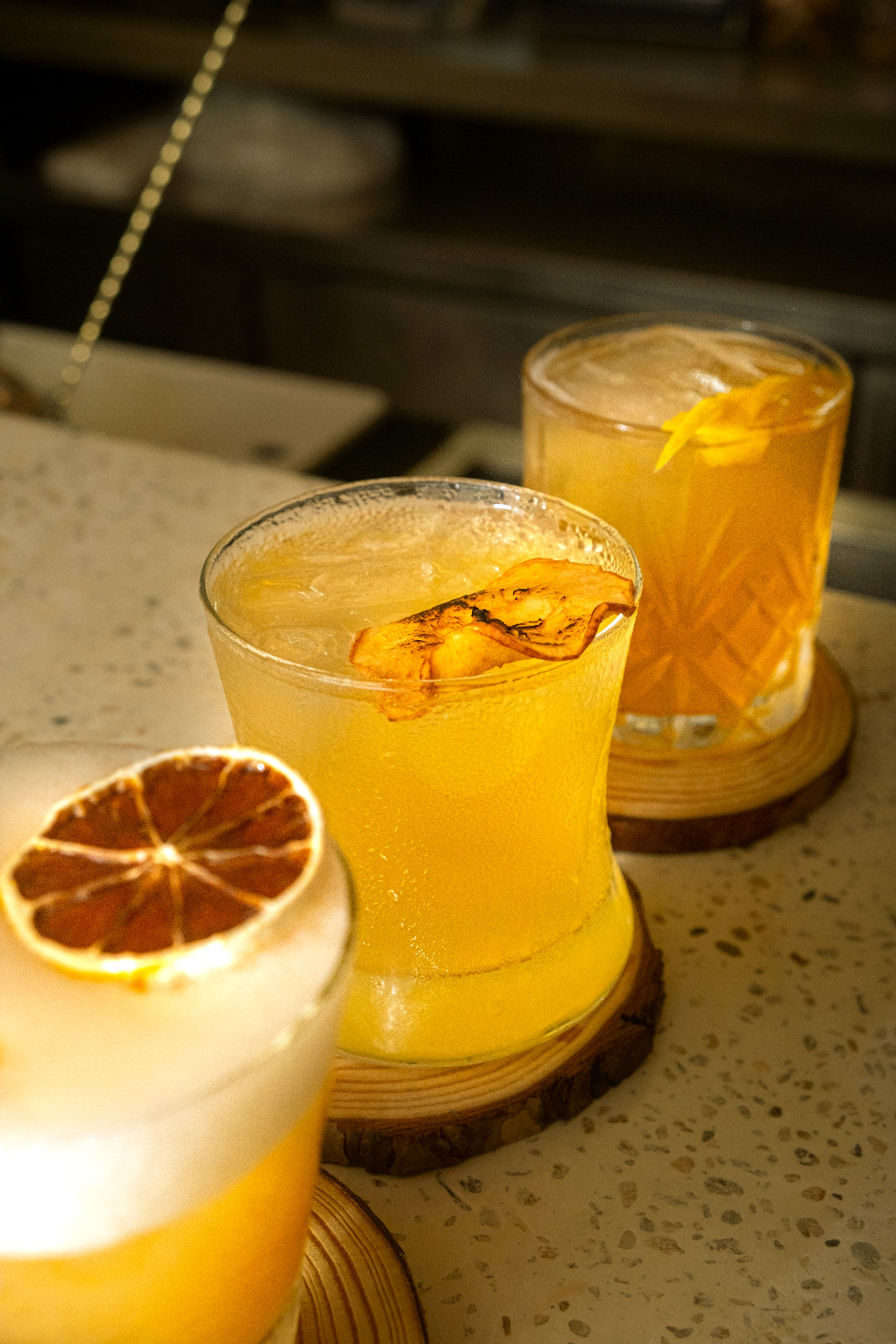 A wide array of cocktails available at Coquito, from the classic amaretto sour to [insert name here]