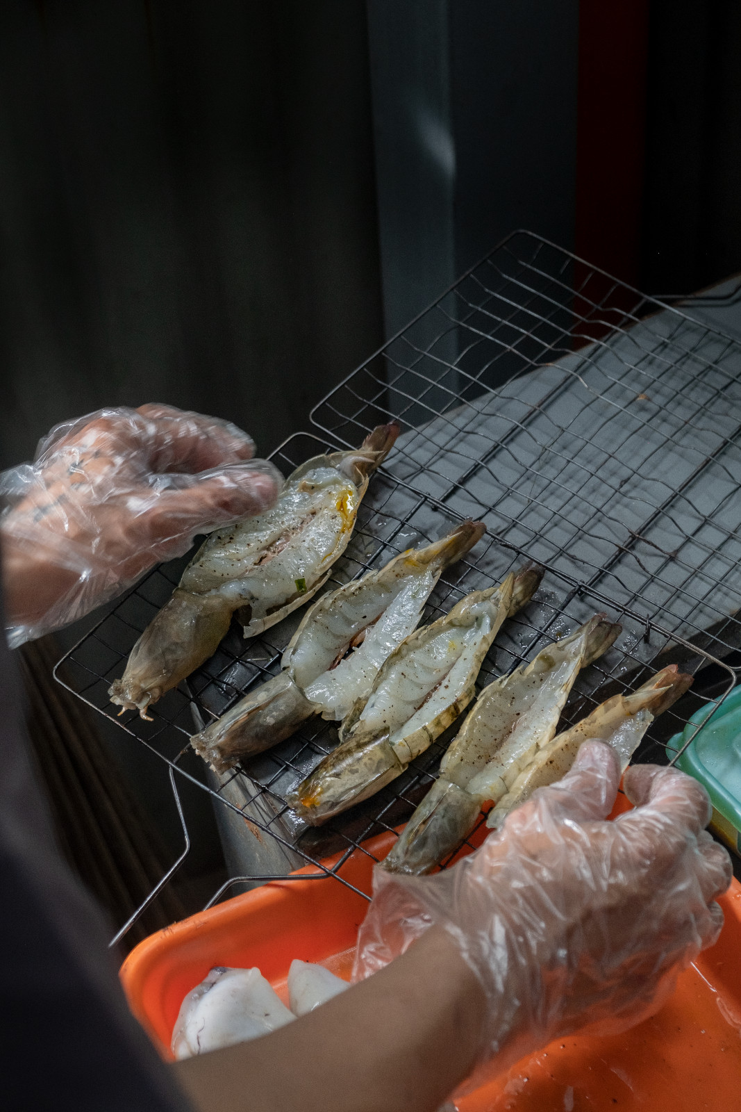 Behind the scenes, succulent shrimp is being grilled at Coquito Boracay