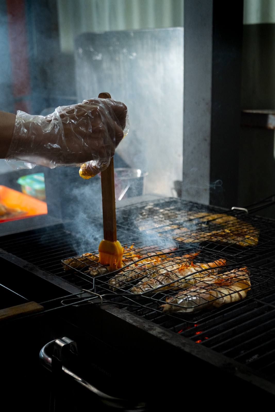 Behind the scenes, succulent shrimp is being grilled at Coquito Boracay