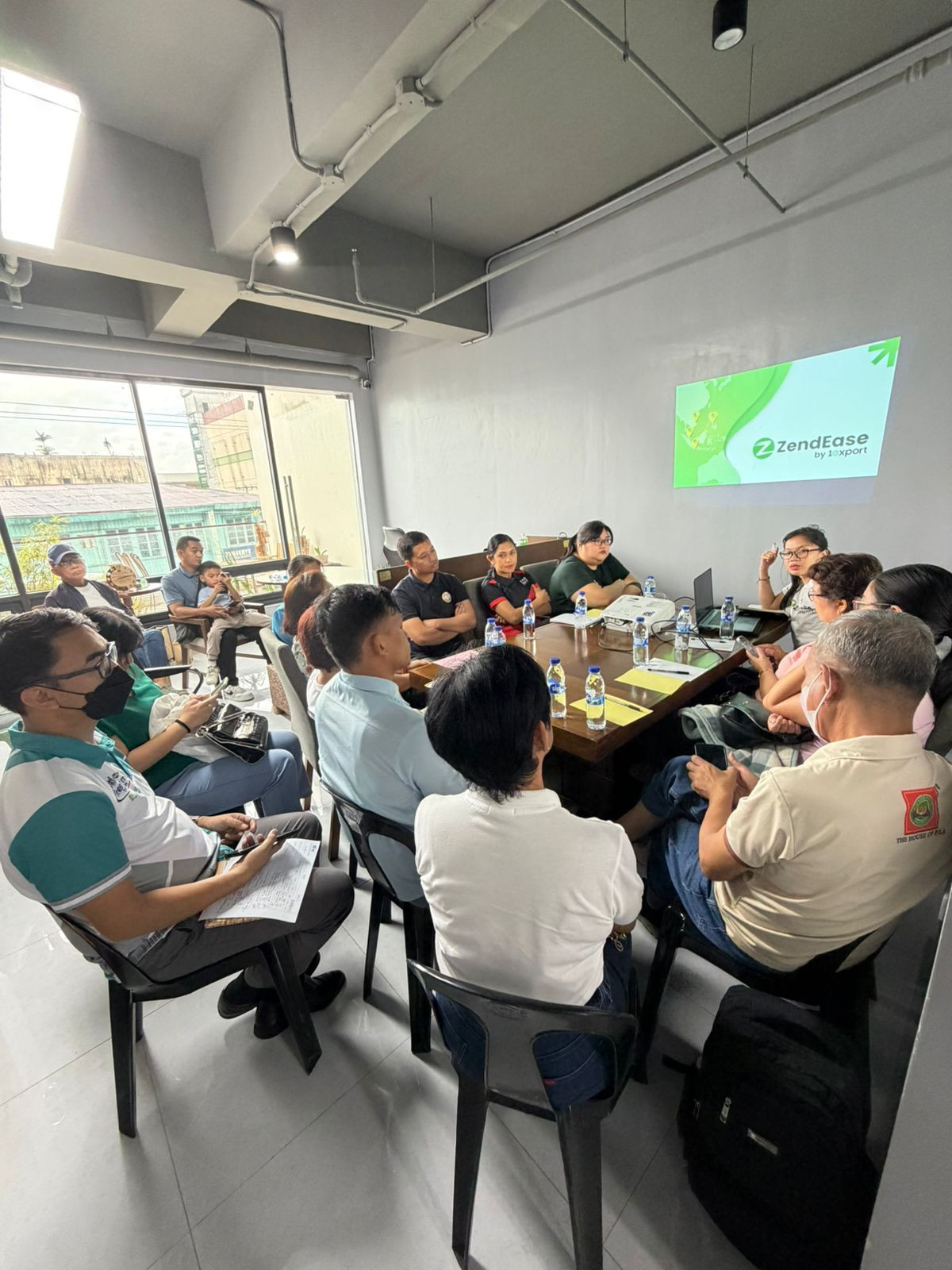 Business leaders and entrepreneurs discuss strategies, with "ZendEase by 1export" projected.