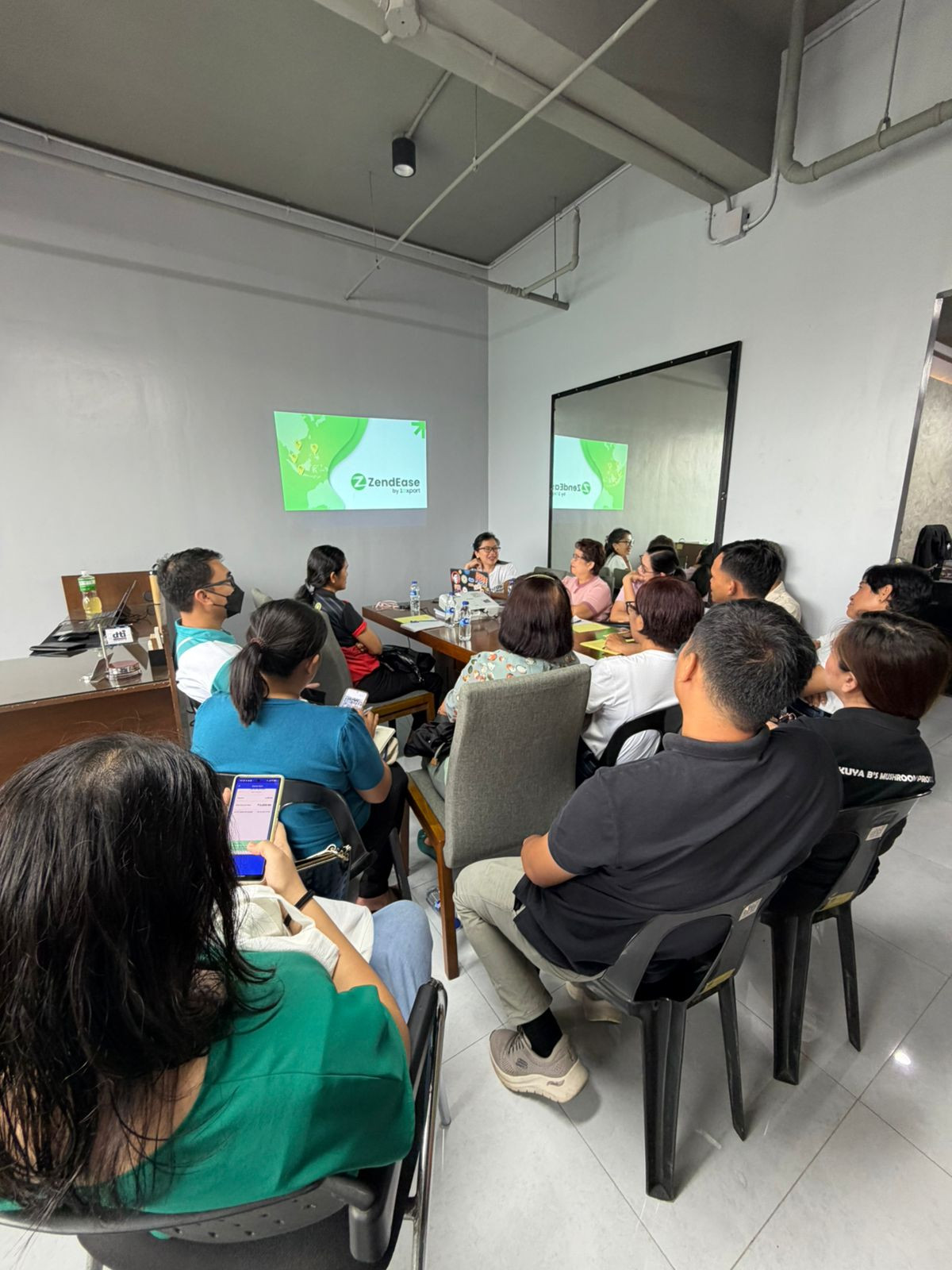 Entrepreneurs engage in a presentation focused on ZendEase by Z-sport.