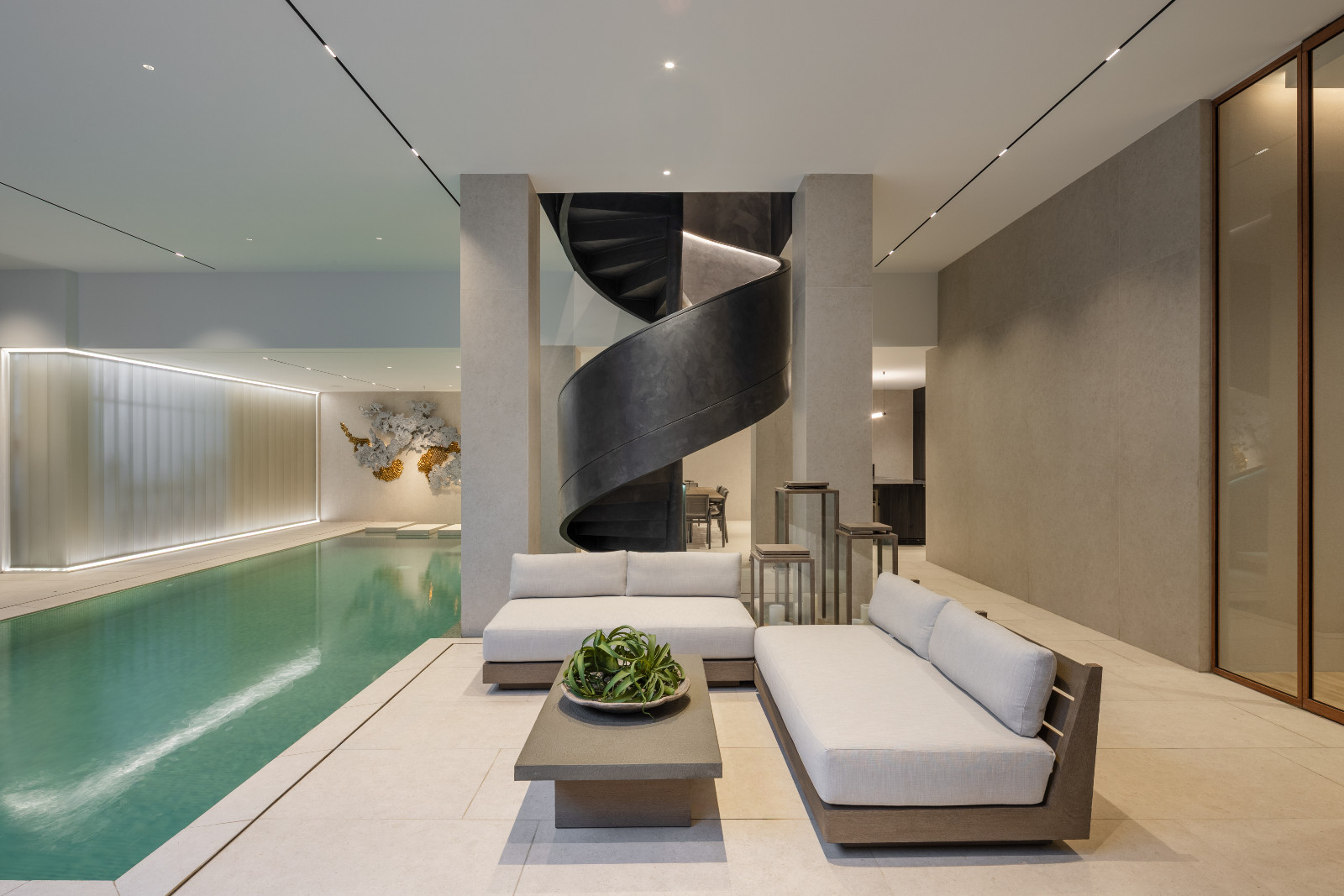 The pool leading up to the entertaining area of Cascade House by H1 Architecture in Manila, Philippines