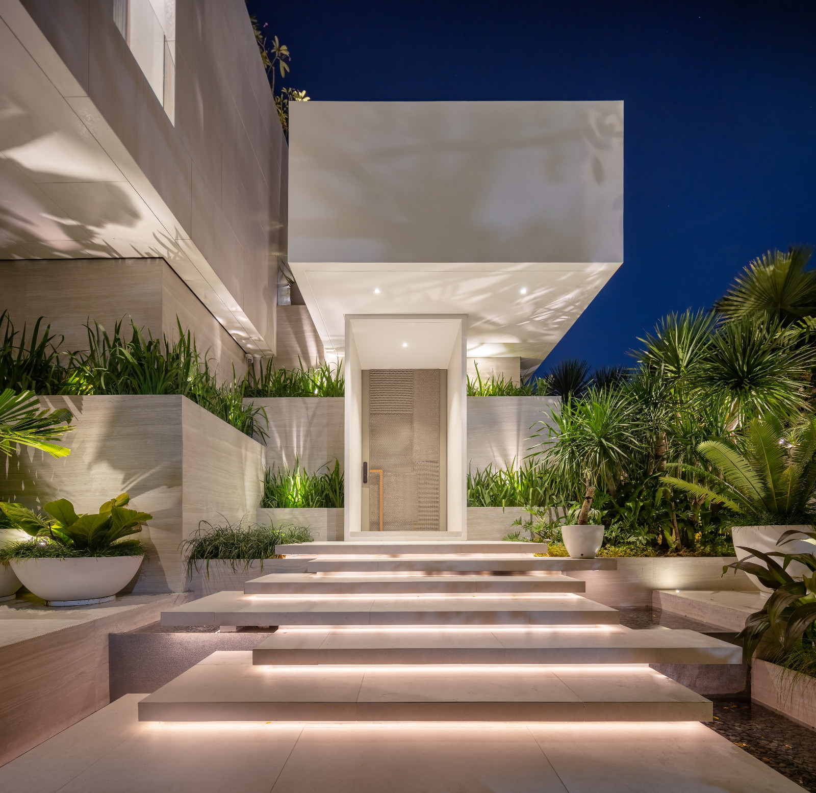 The entryway of Cascade House by H1 Architecture in Manila, Philippines