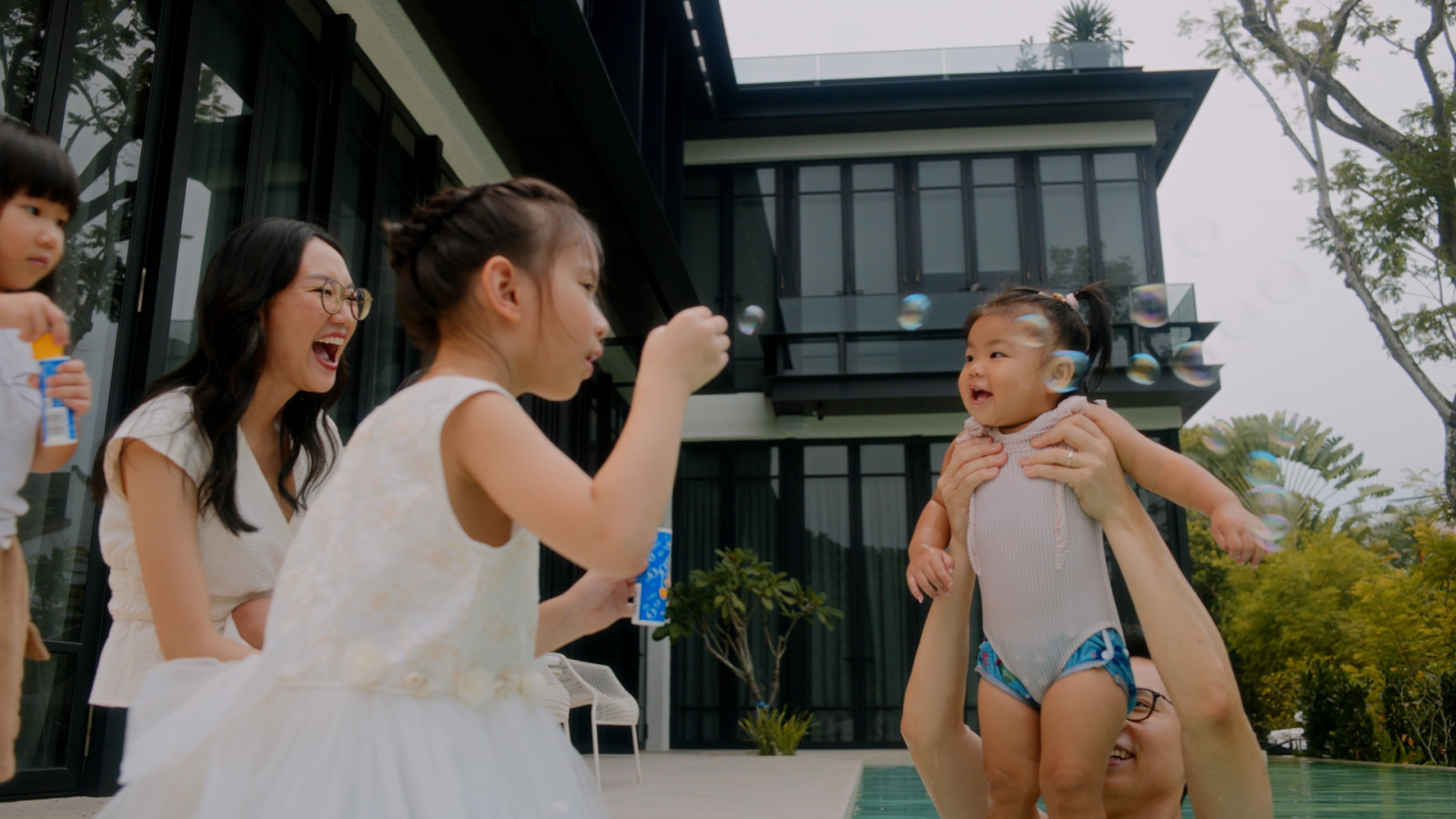 Bubbles, laughter and cousins who are more like siblings, the everyday magic of a multigenerational home