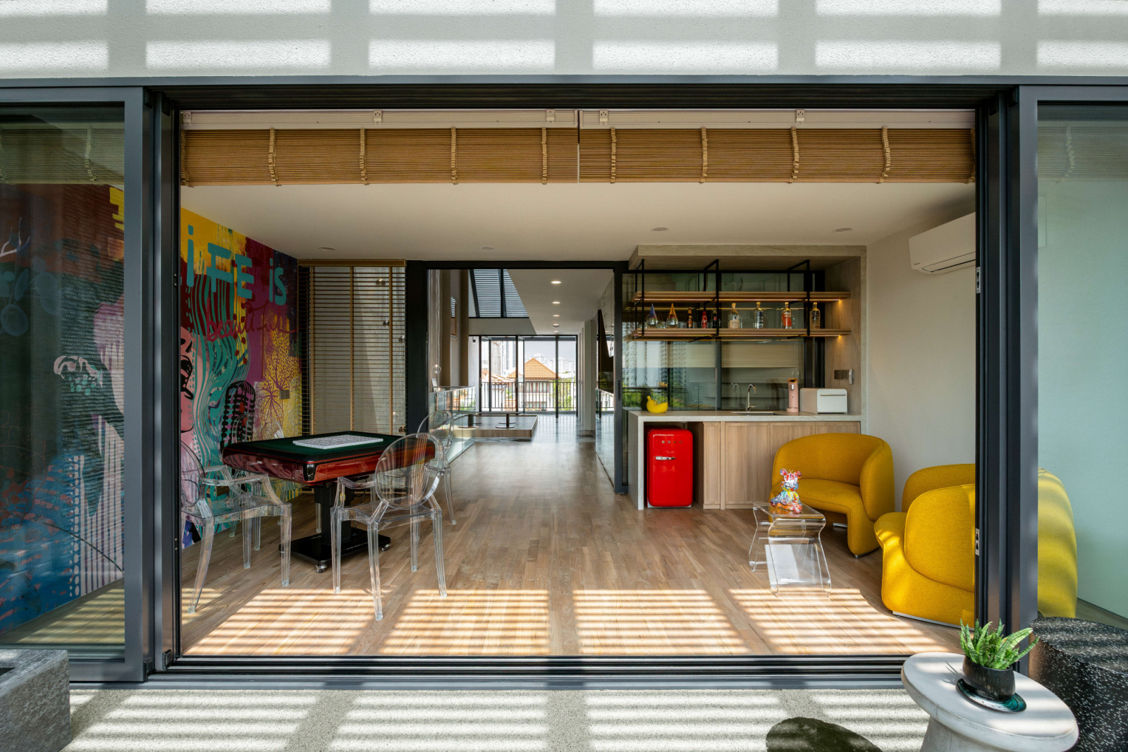 Playful pops of colour in the entertainment area create a social atmosphere