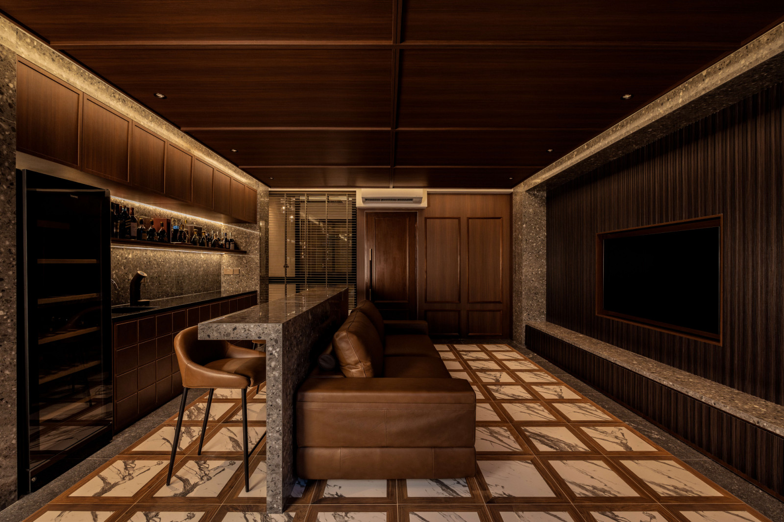 A gentlemen’s bar on the second storey provides a more intimate setting for entertaining