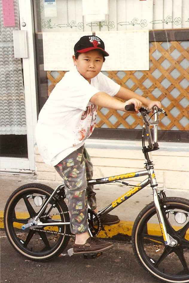 Growing up in North Miami Beach, a young Jin spent his evenings taking orders at his parents’ Chinese takeaway restaurant. (Photo: courtesy of MC Jin)