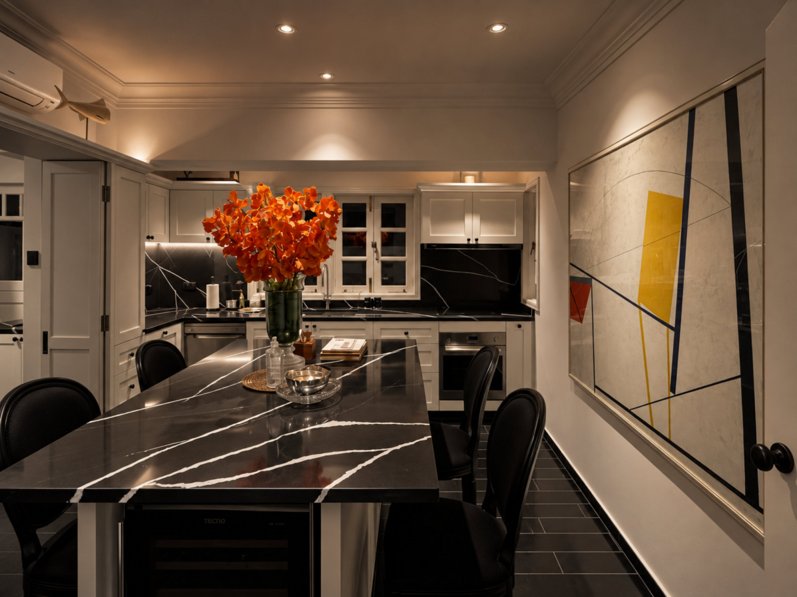 The existing kitchen nook was incorporated into the dining room to make space for a 3.25m-long dining table