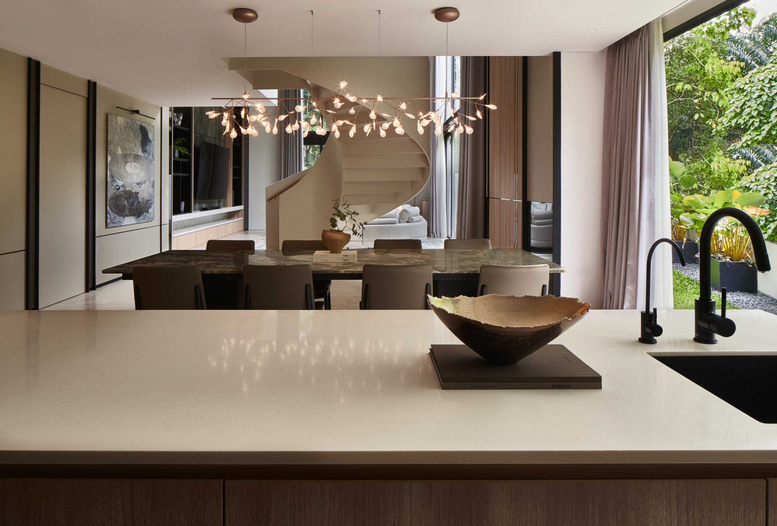 The dry kitchen has a direct sightline to the dining area, so one can remain connected with family and loved ones while prepping a meal