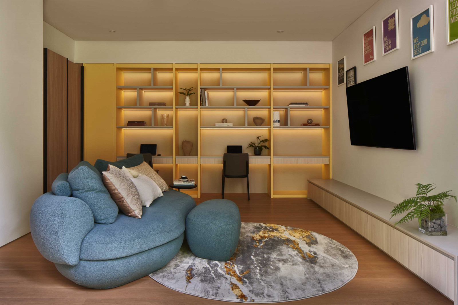 The boys’ second living room is designed so that it can be converted into a study room as they get older