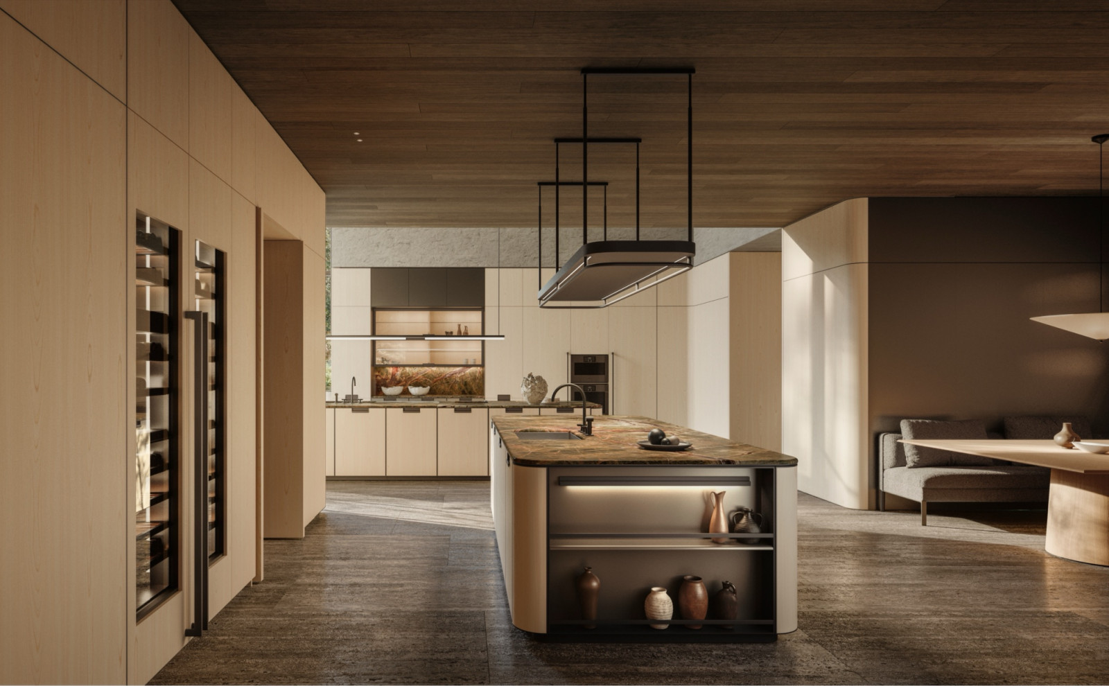 The curved treatment for Physis continues through the sink and snack counter, where a metal insert follows the line of the worktop