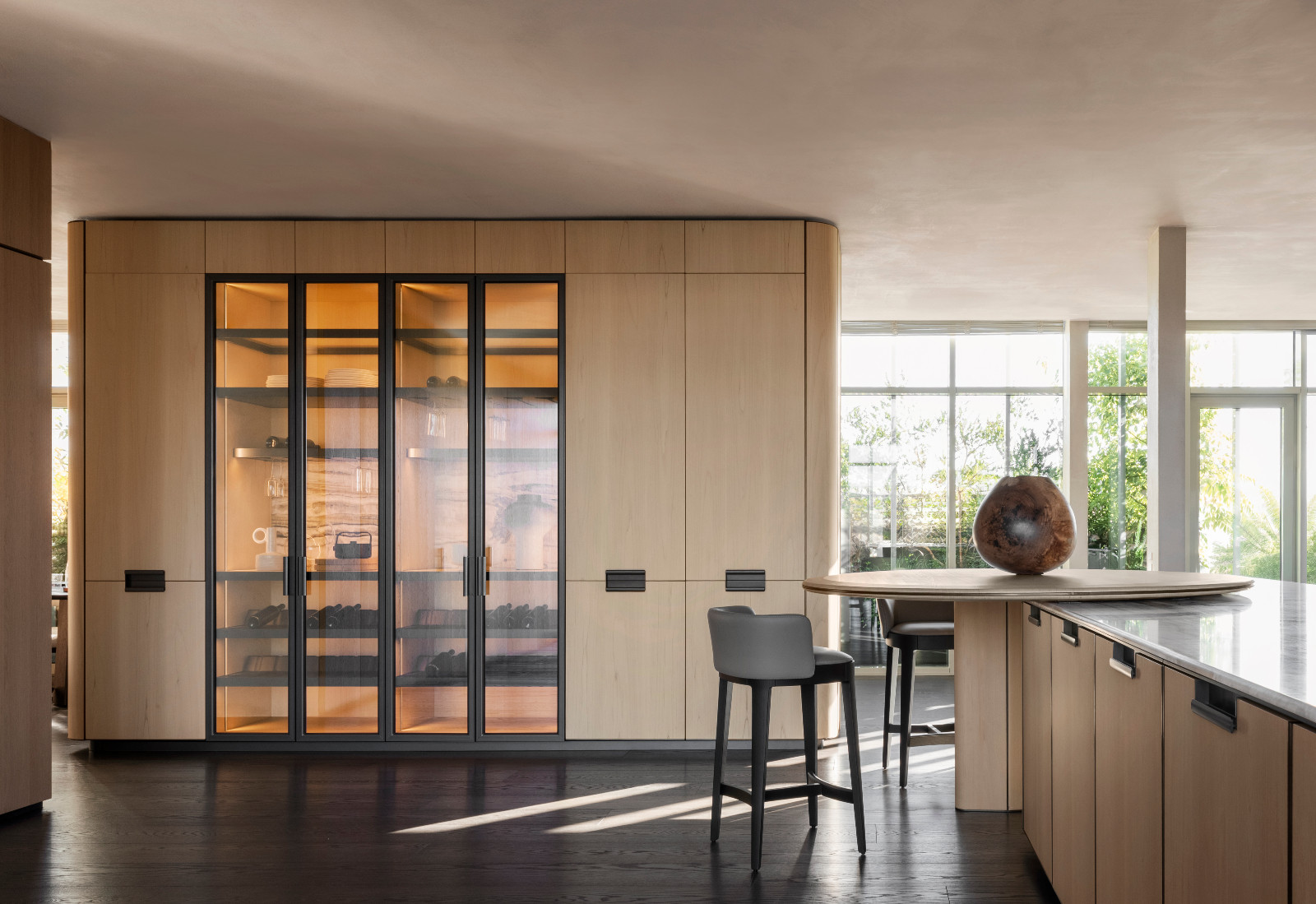 The Physis kitchen system features rounded edges and sides with half-bullnose workmanship