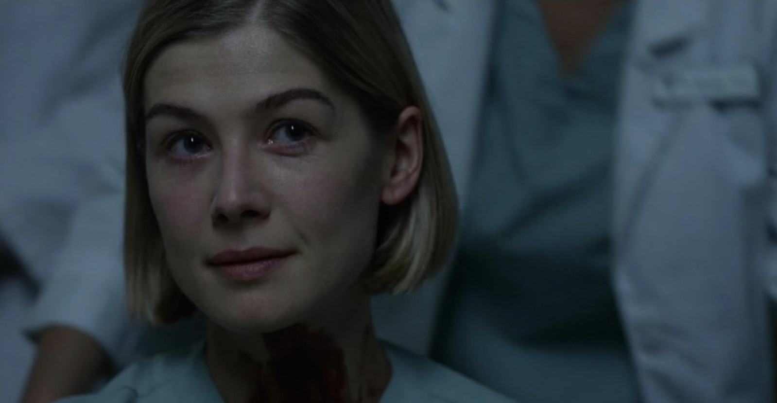 Rosamund Pike embodies the mental burden of demanding careers, illustrating why it's so hard to truly switch off.