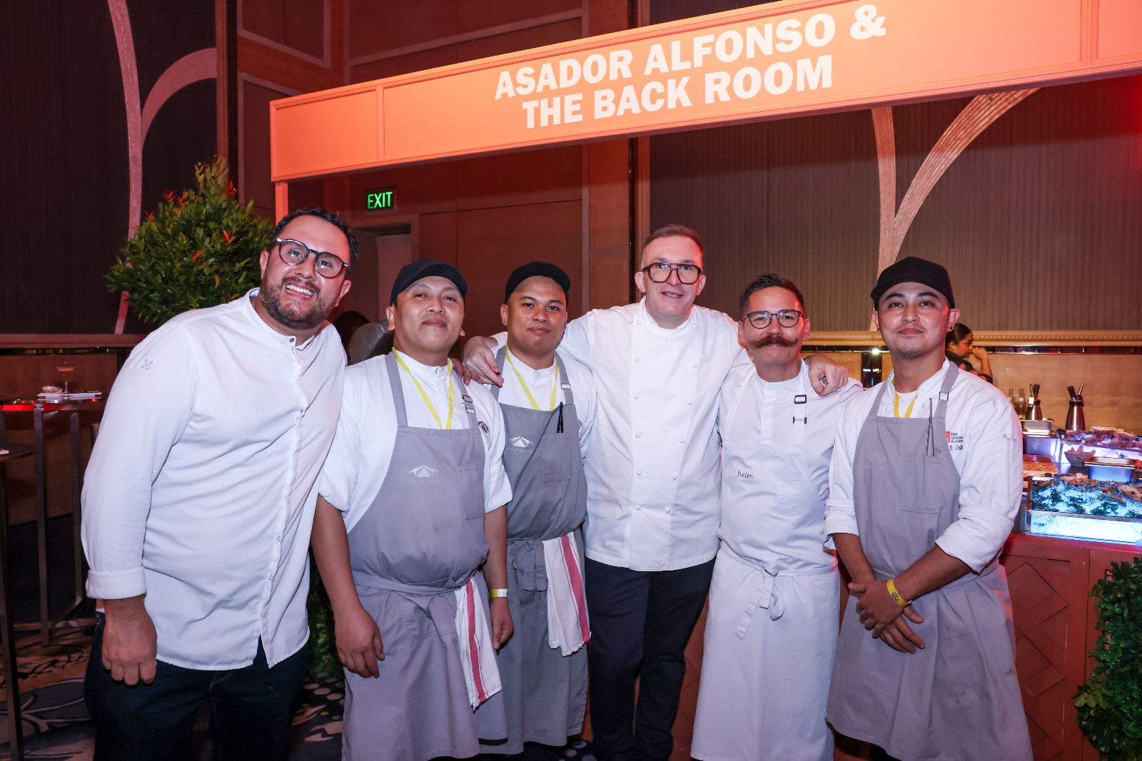 Team Asador Alfonso posing with chef Josh Boutwood at Off Menu 2026