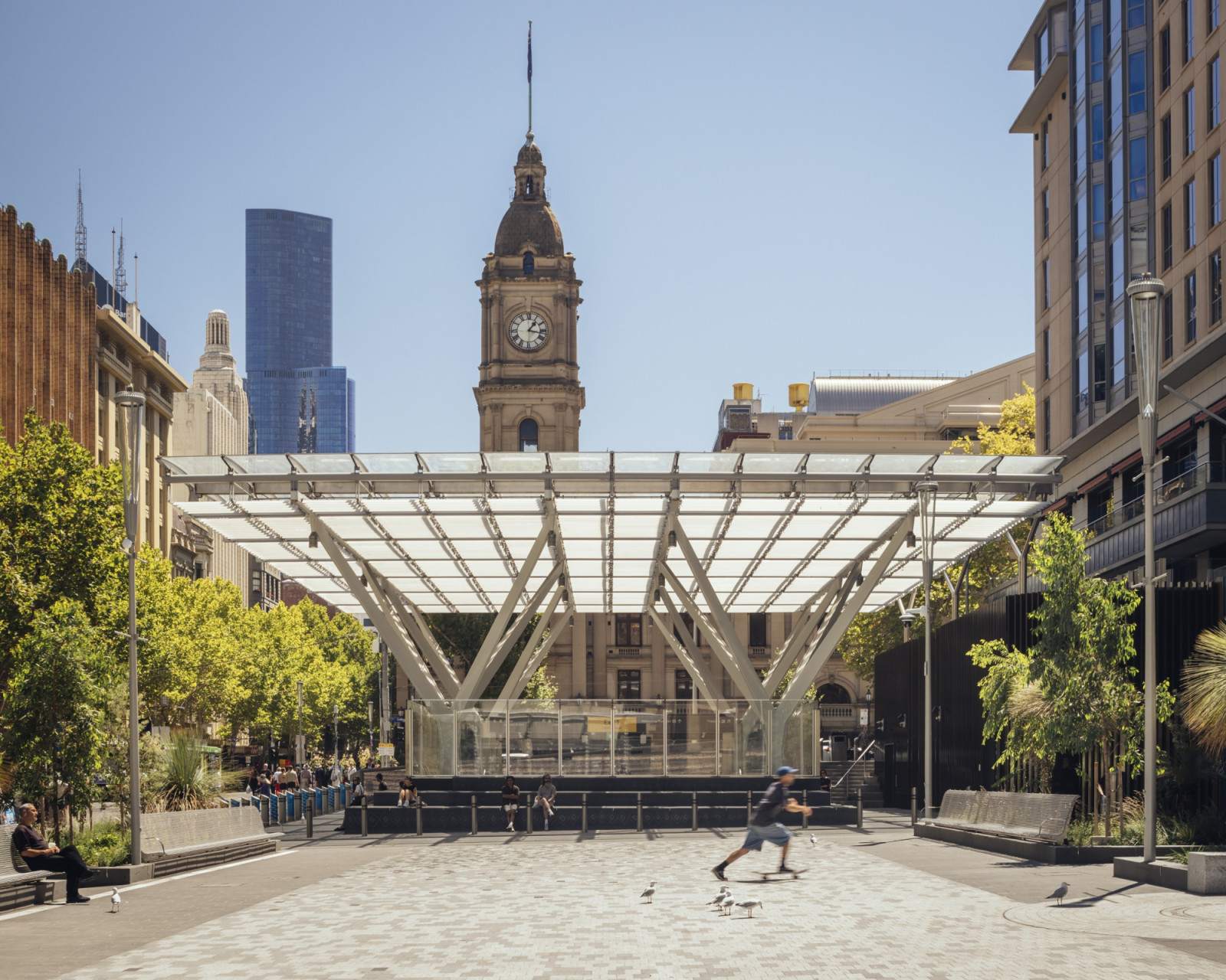 The City Square entrance to Town Hall Station in Melbourne by Hassell, RSHP and WW+P sits beneath a glass canopy held up by branching steel columns (Photo: Jim Stephenson
