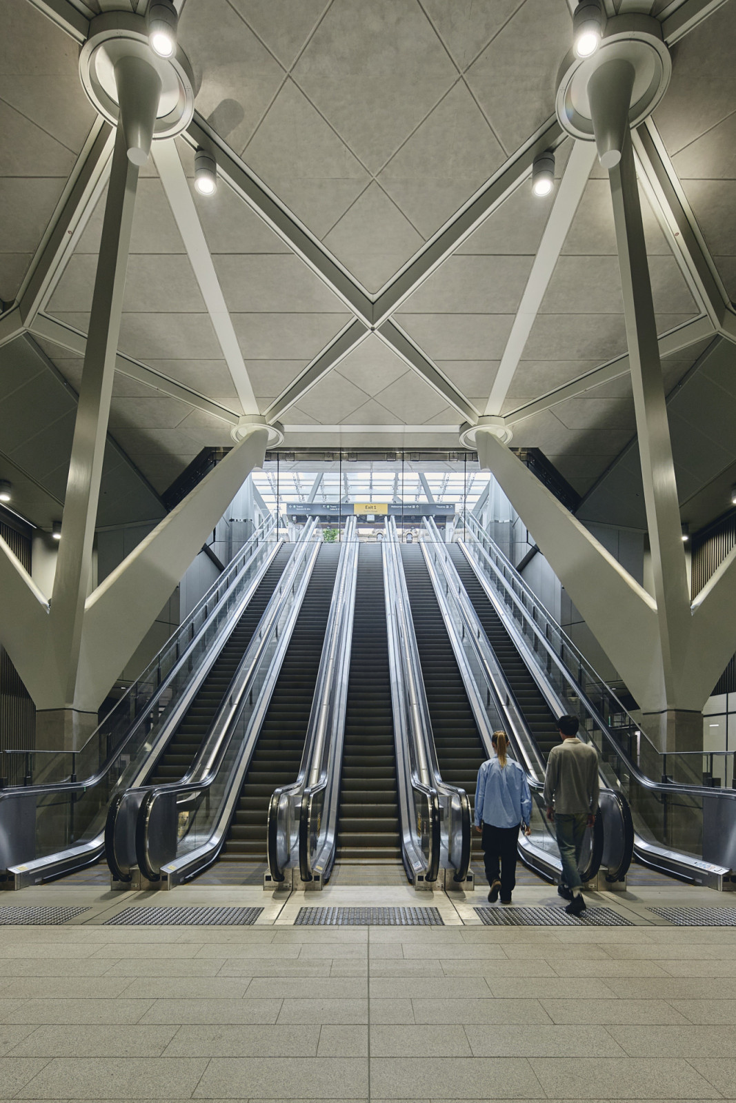 A bank of escalators rises from the concourse towards the Collins Street exit at Town Hall Station in Melbourne (Photo: Peter Bennetts)