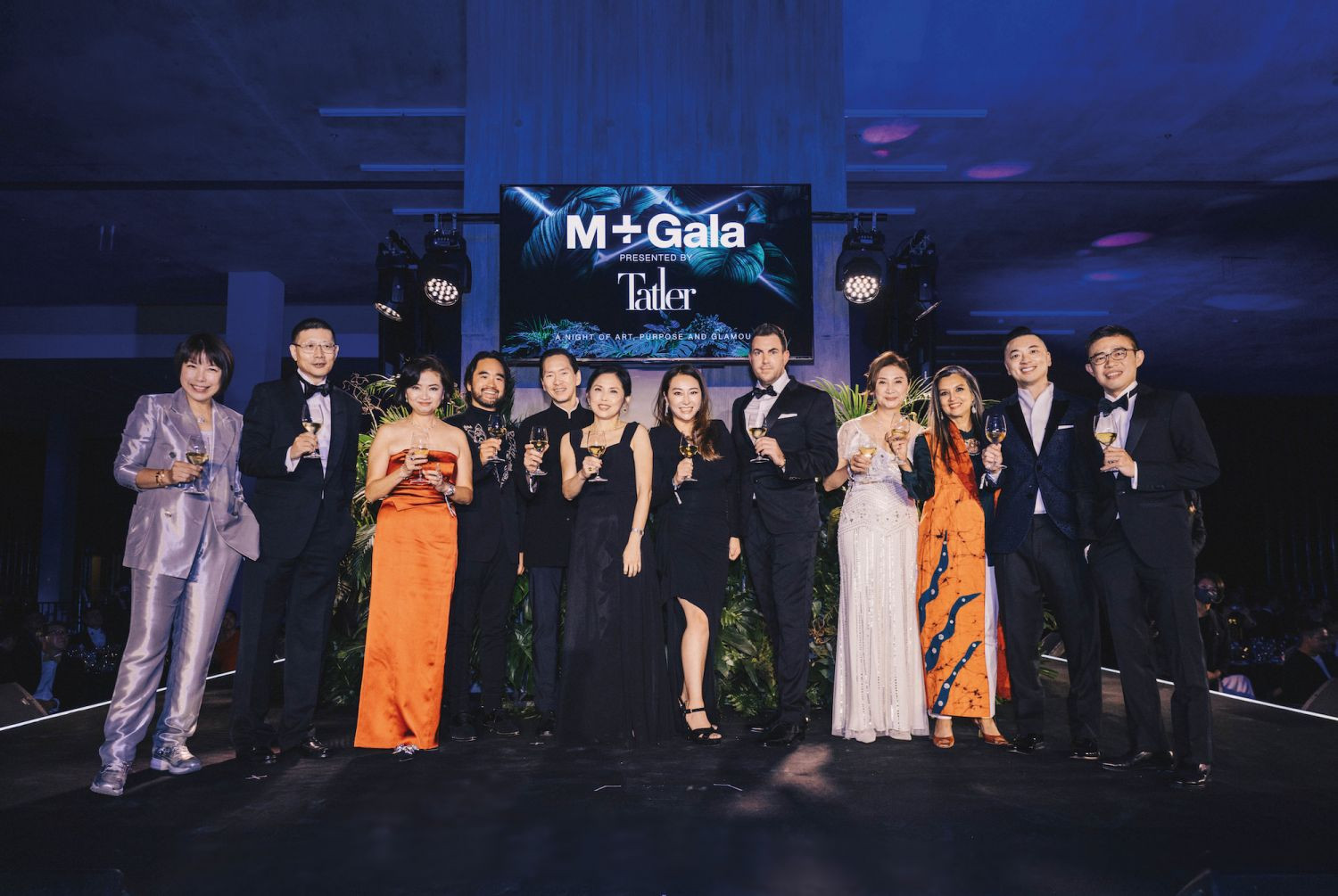 From left: Angelica Cheung, Neil Shen, Christine Ip, Adrian Cheng, Bernard Chan, Betty Fung, Winnie Chiu, Michel Lamunière, Catherine Kwai, Suhanya Raffel, Danny Yeung and Alan Lau—guests at the 2022 M+ Gala, presented by Tatler (Photo: Kenneth Tang/Tatler Hong Kong)