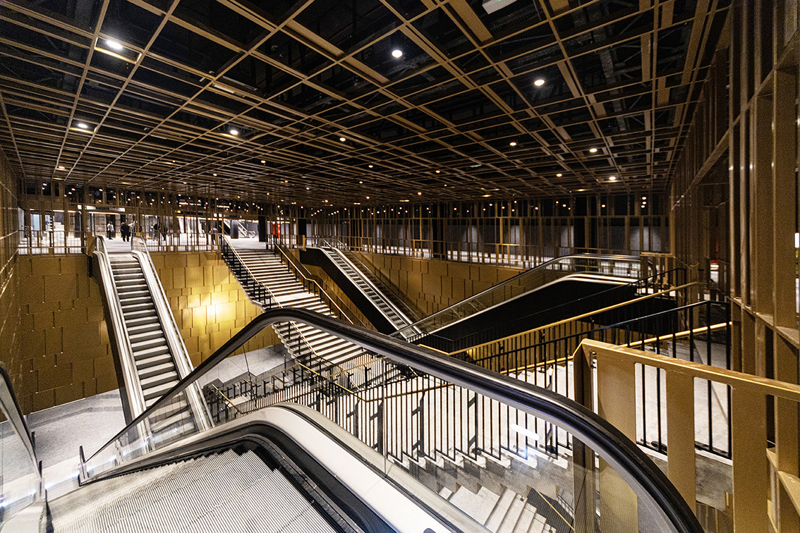 Passengers changing lines at Colosseo-Fori Imperiali Station in Rome can see the Colosseum through an angled oculus cut into the concrete (Photo: Aldo Magnani / Casalgrande Padana)