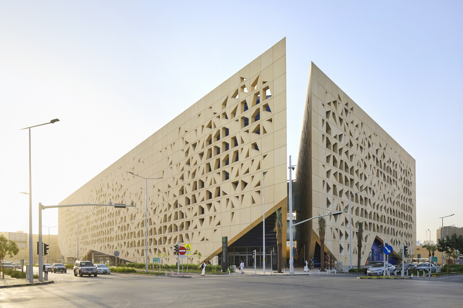 A glazed entrance sits beneath a gold-toned faceted canopy at National Museum Station, the interchange for the Riyadh Metro’s Blue and Green Lines (Photo: Hufton+Crow)