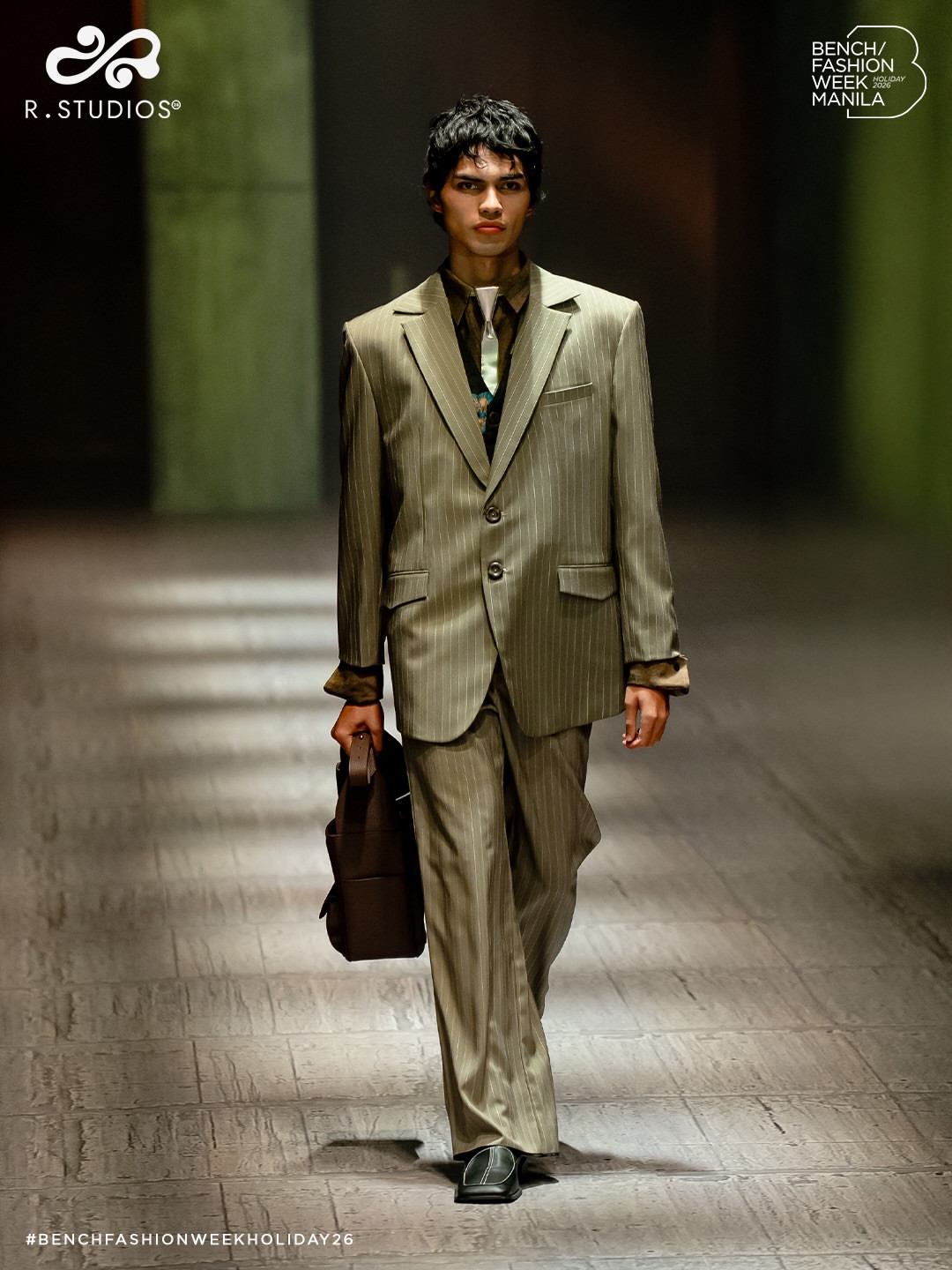 R. STUDIOS presented this pinstriped suit from its Holiday 2026 collection