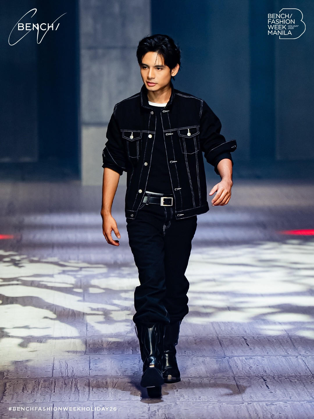 Bench's Holiday 2026 collection features an all-black denim ensemble at Manila Fashion Week.