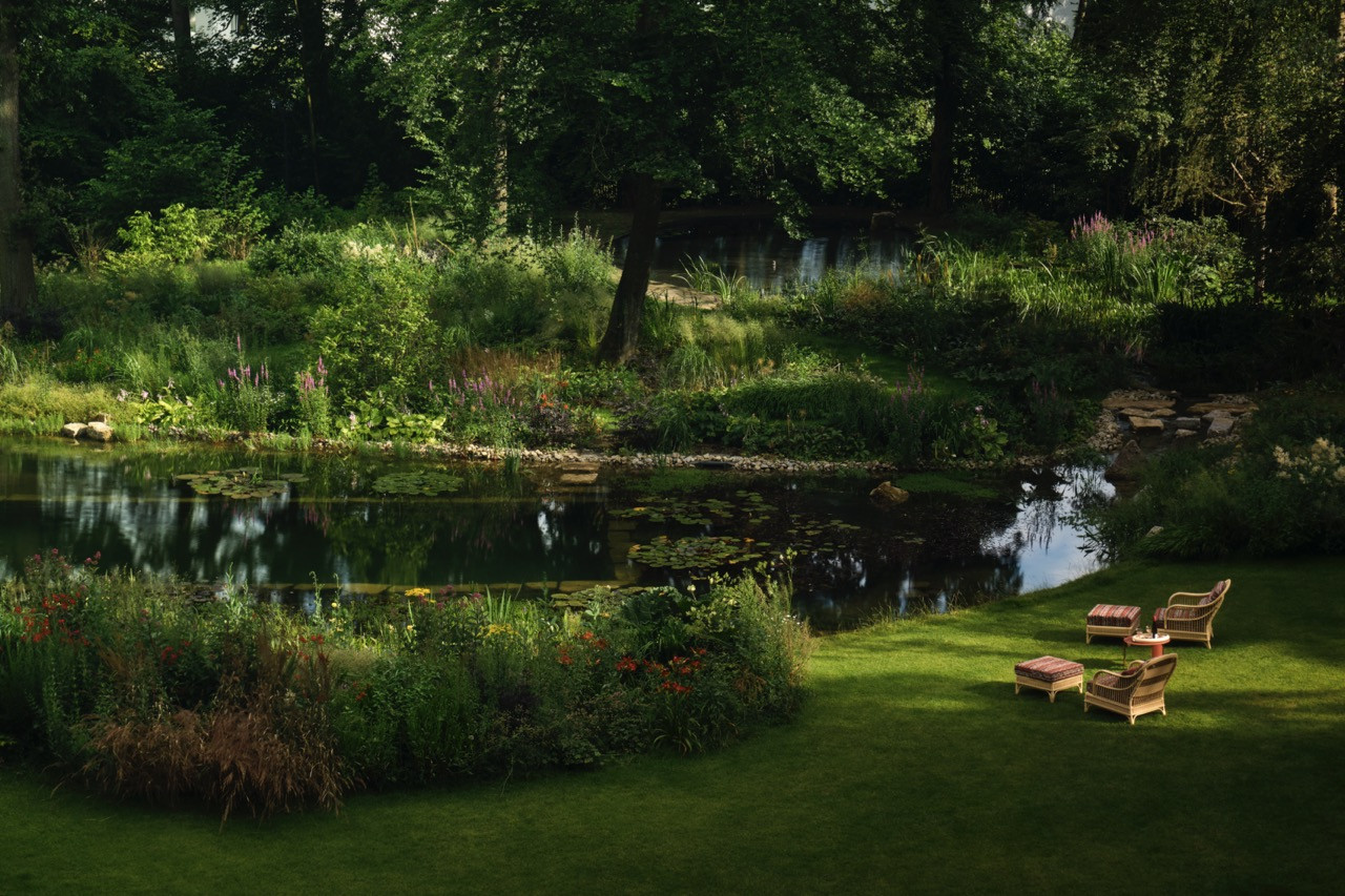 The lush garden complete with pond
