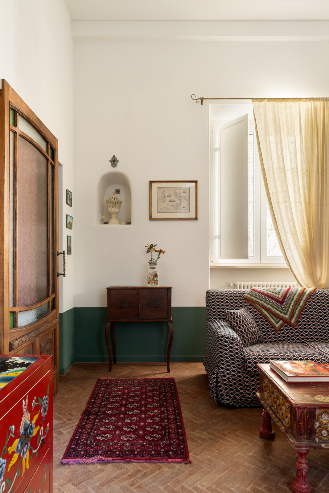 An eclectic collection of objects procured during the homeowners’ travels and inherited from her family