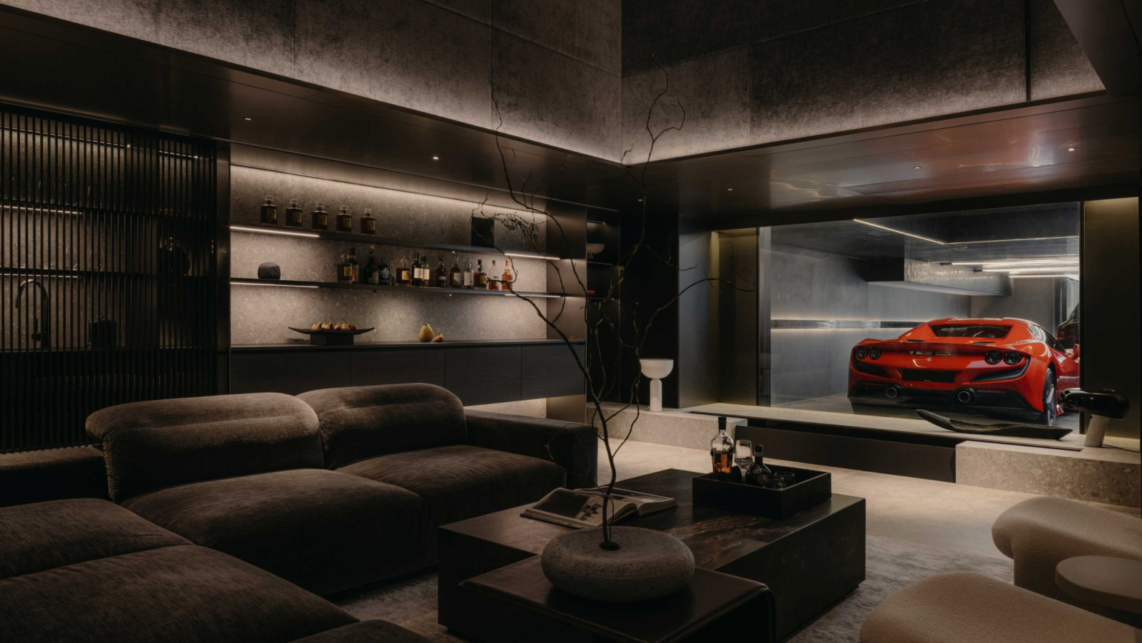 TA.CO Architects transforms a detached house with a renovation that balances dark, luxurious materials with thoughtfully designed spaces for family life and entertaining
