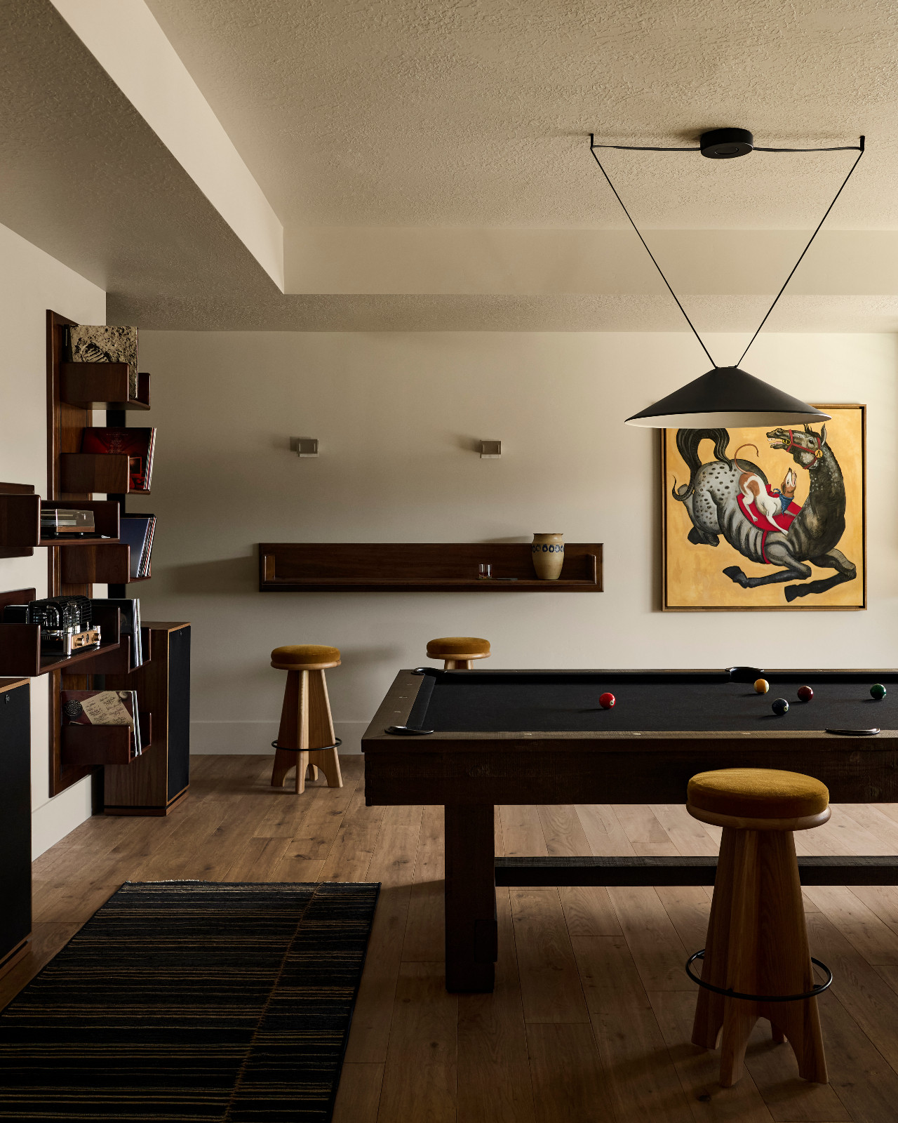 The billiards table of a Utah family home designed by Cari Giannoulias