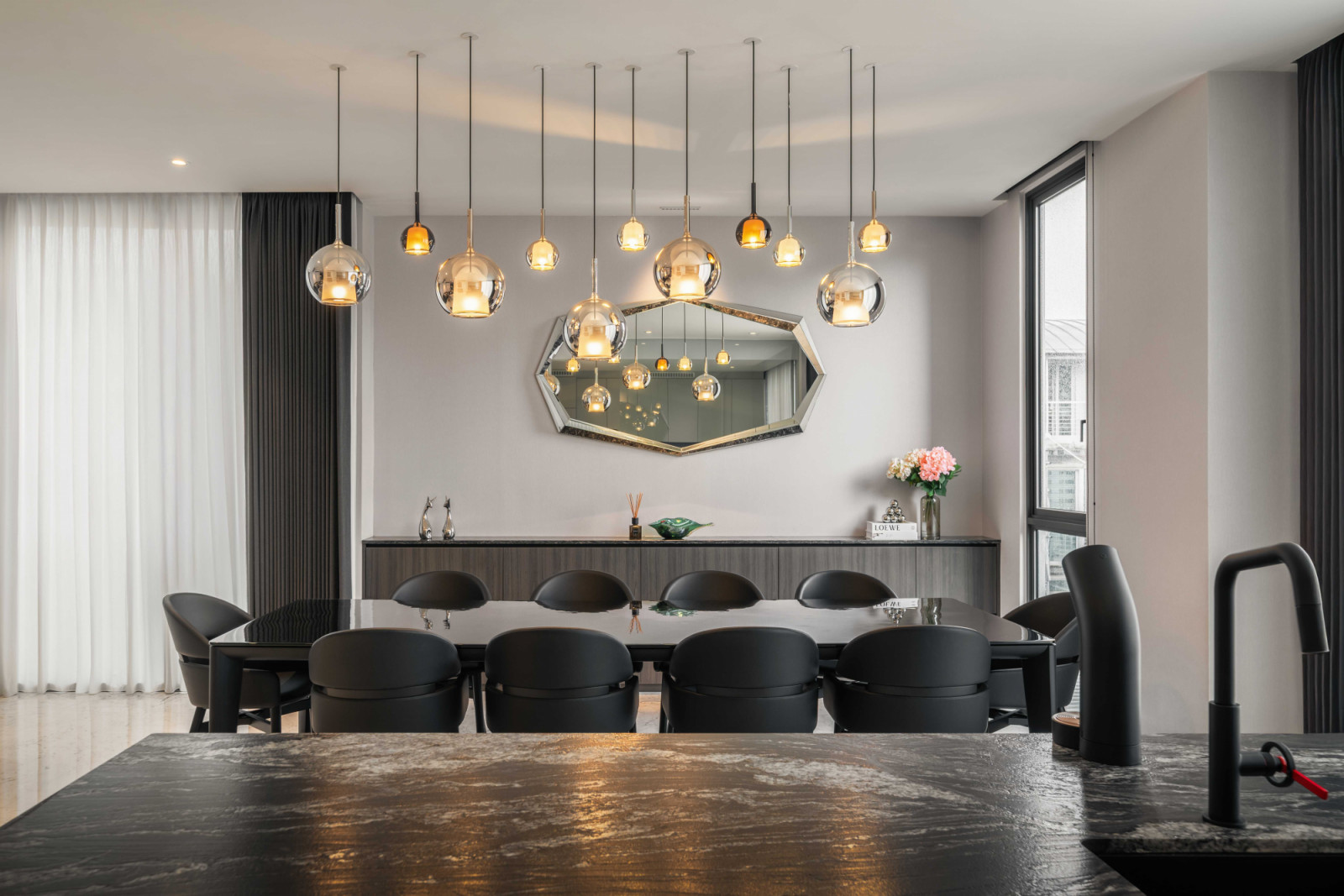 A large Fiam Flaminio dining table stands ready to accommodate dinner guests