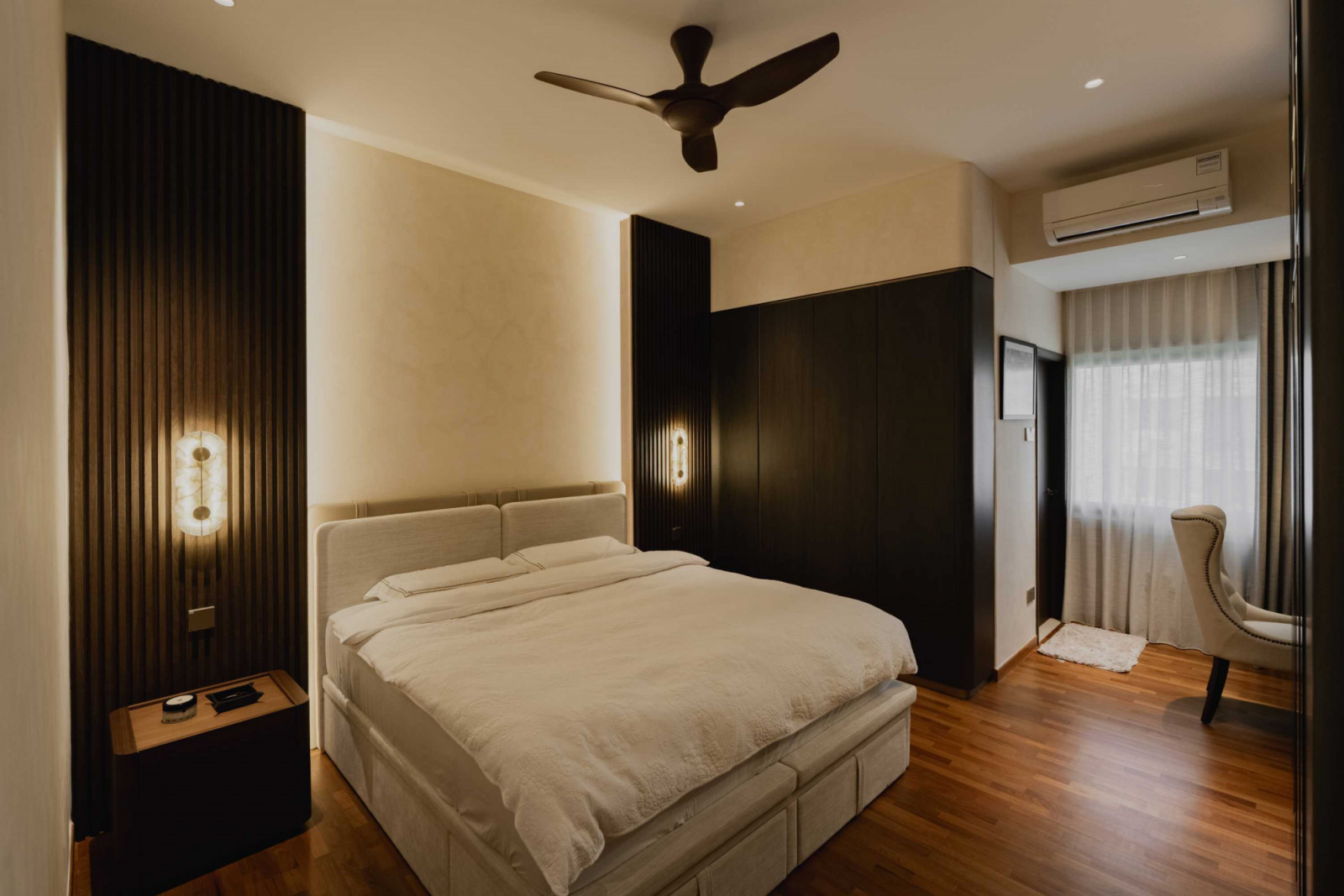 White bedclothes add a crisp coolness to the master bedroom