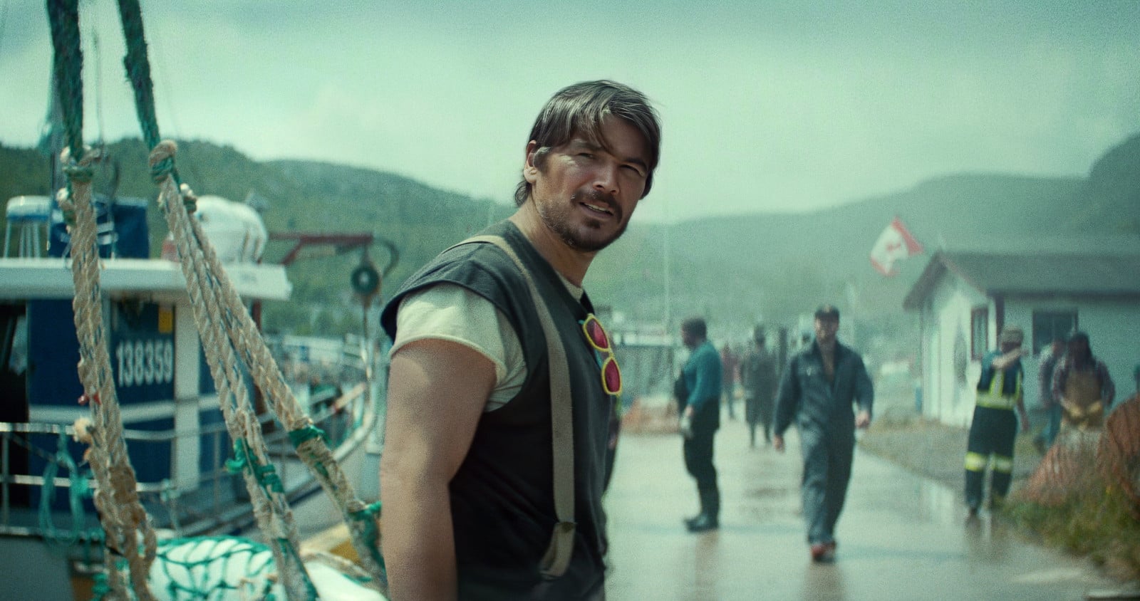 A rugged figure smiles on a bustling Canadian dock, one of the many compelling characters brought to viewers by Netflix.