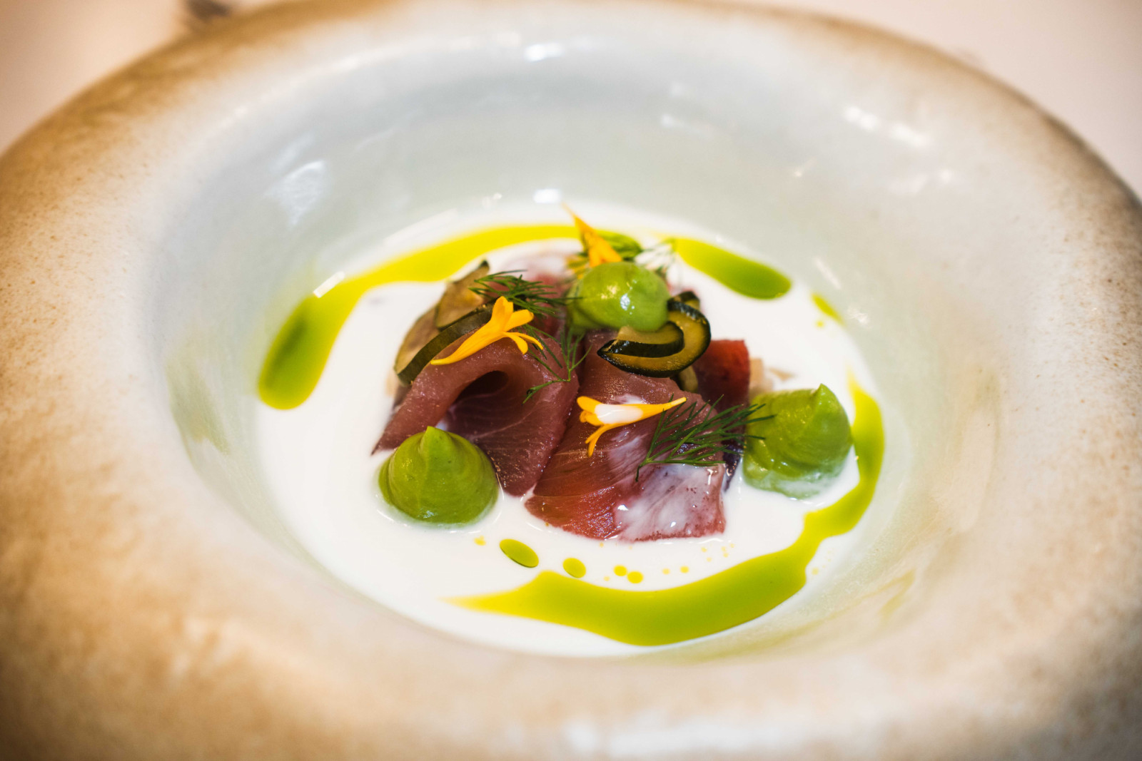 Skipjack tuna sashimi with avocado, cucumber, buttermilk and dill oil