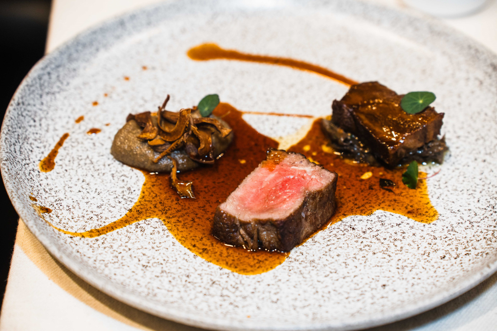 Roast Wagyu beef and braised cheek with seasonal vegetables and creamed mushroom ragout
