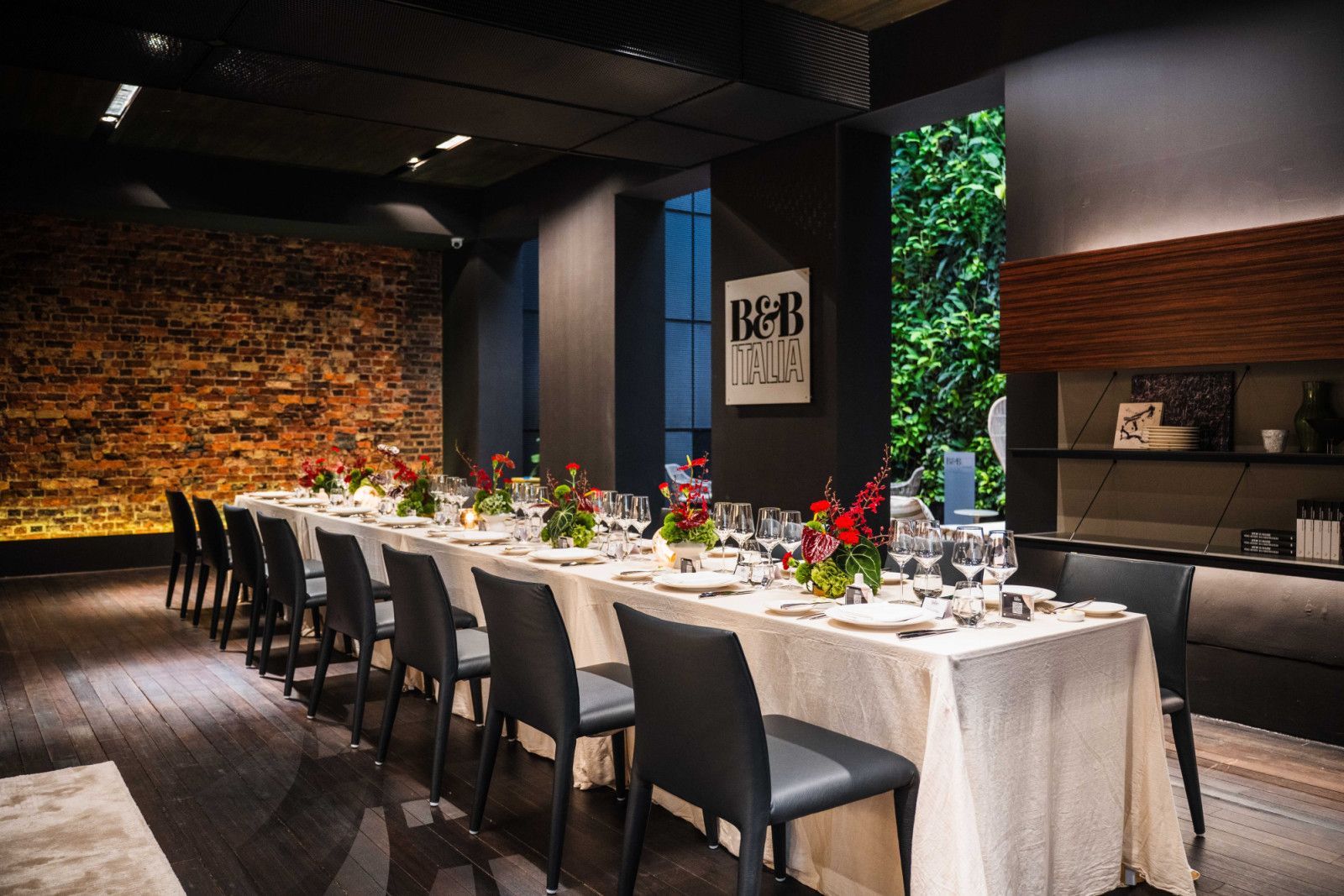 The long table, dressed with florals by Fiore Dorato, in the B&B Italia Gallery at Space Furniture
