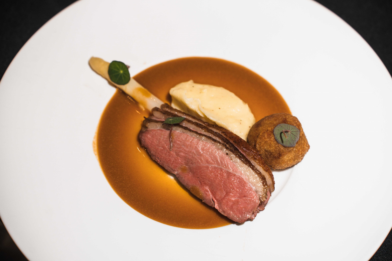 Barbary duck breast and confit leg with seasonal vegetables, potato mousseline and foie gras sauce