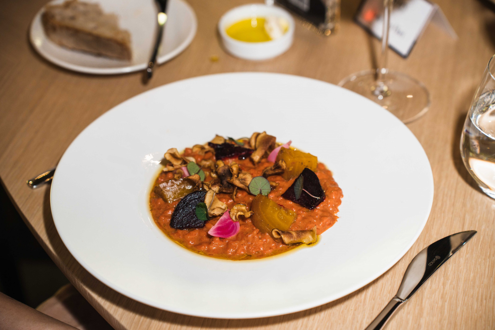 Beet risotto with Parmesan, seasonal vegetables and nasturtium leaves, the vegetarian main on the second night