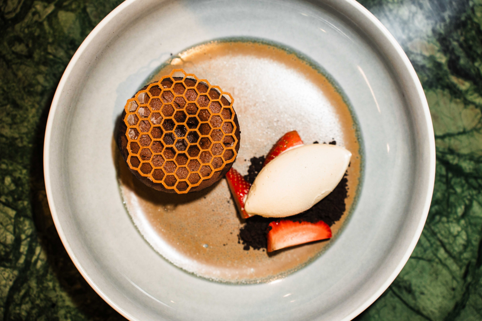 Valrhona molten chocolate cake with Tahitian vanilla ice cream and strawberry