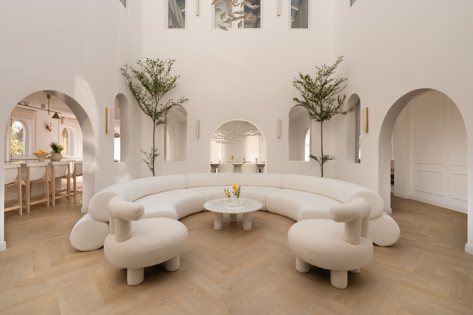 Nicknamed The White Arcade, the home was shaped around the need for sanctuary—guided by the philosophy of artful minimalism, sculptural softness, and emotional clarity
