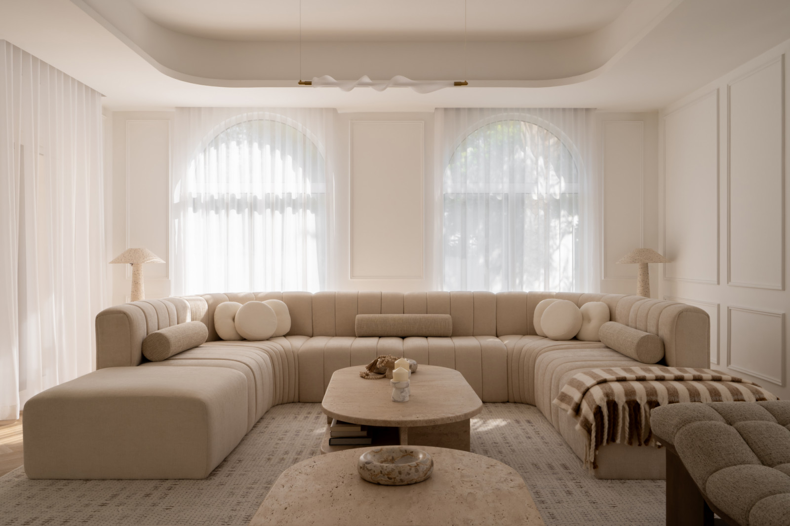 The living room was designed to “hug, hold, and gently cradle”